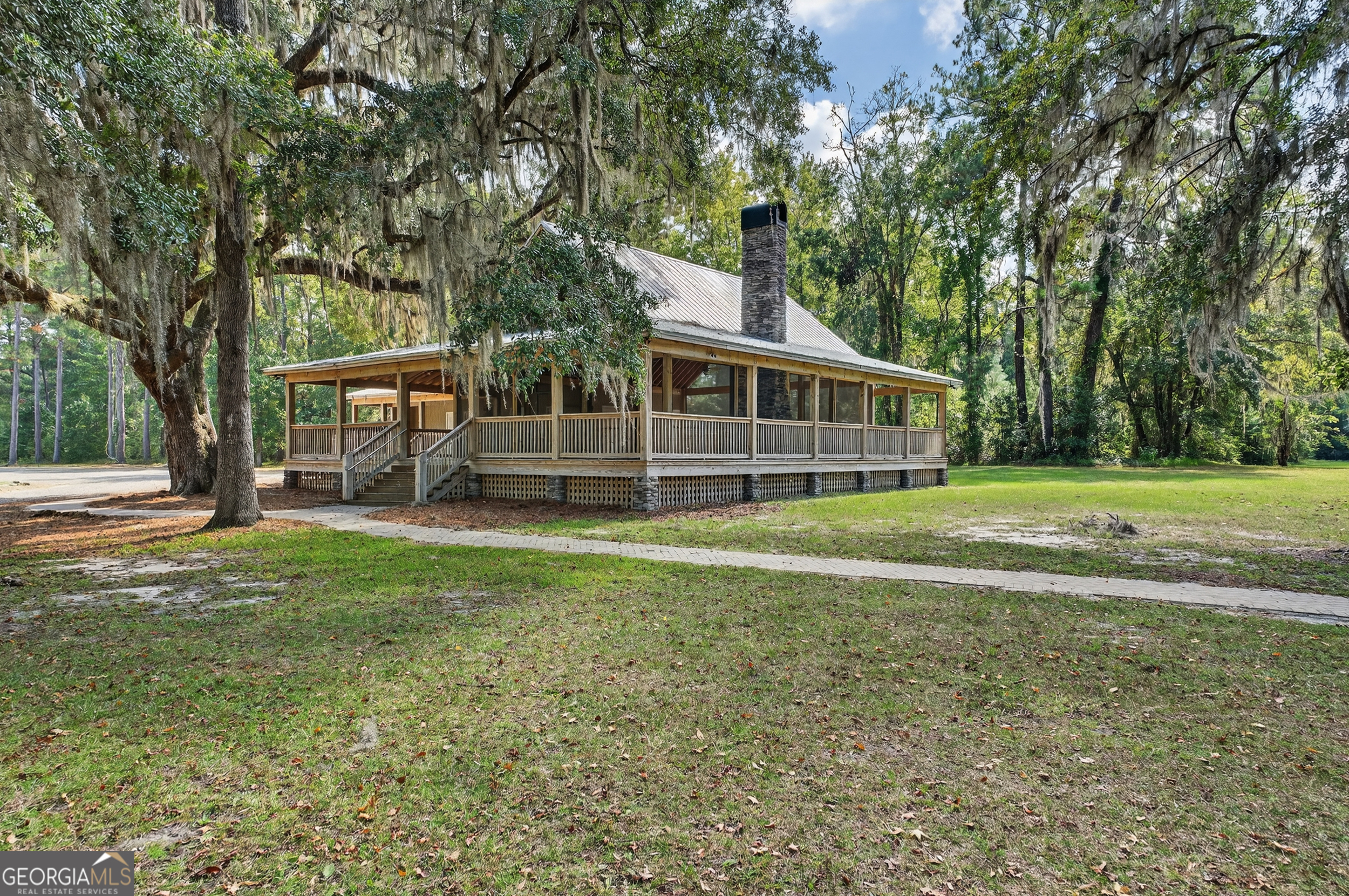 615 Breakwater Loop Kingsland, GA 31548 - Photo 22 of 25 a view of a house with a backyard