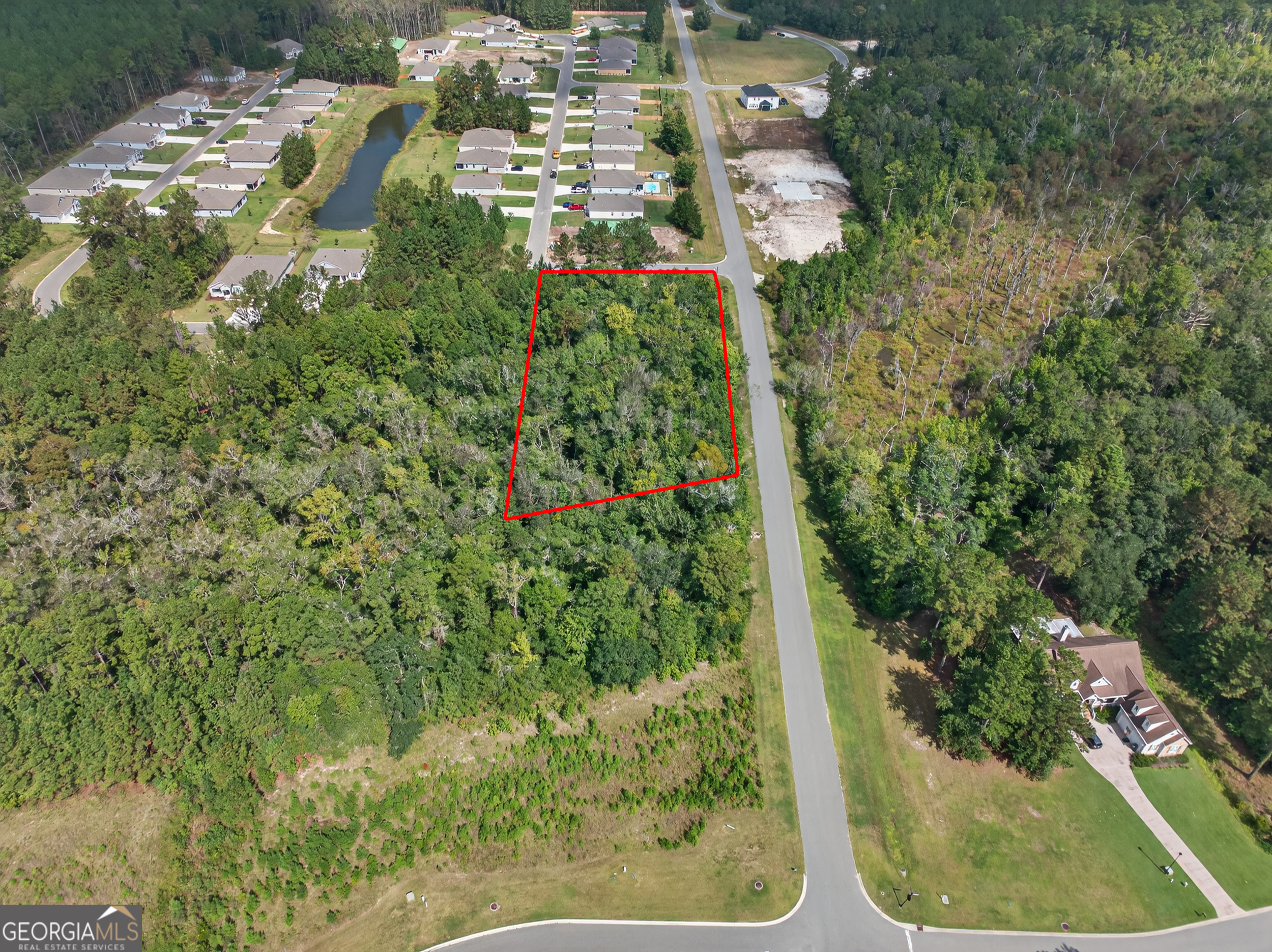 615 Breakwater Loop Kingsland, GA 31548 - Photo 4 of 25 an aerial view of residential houses with outdoor space