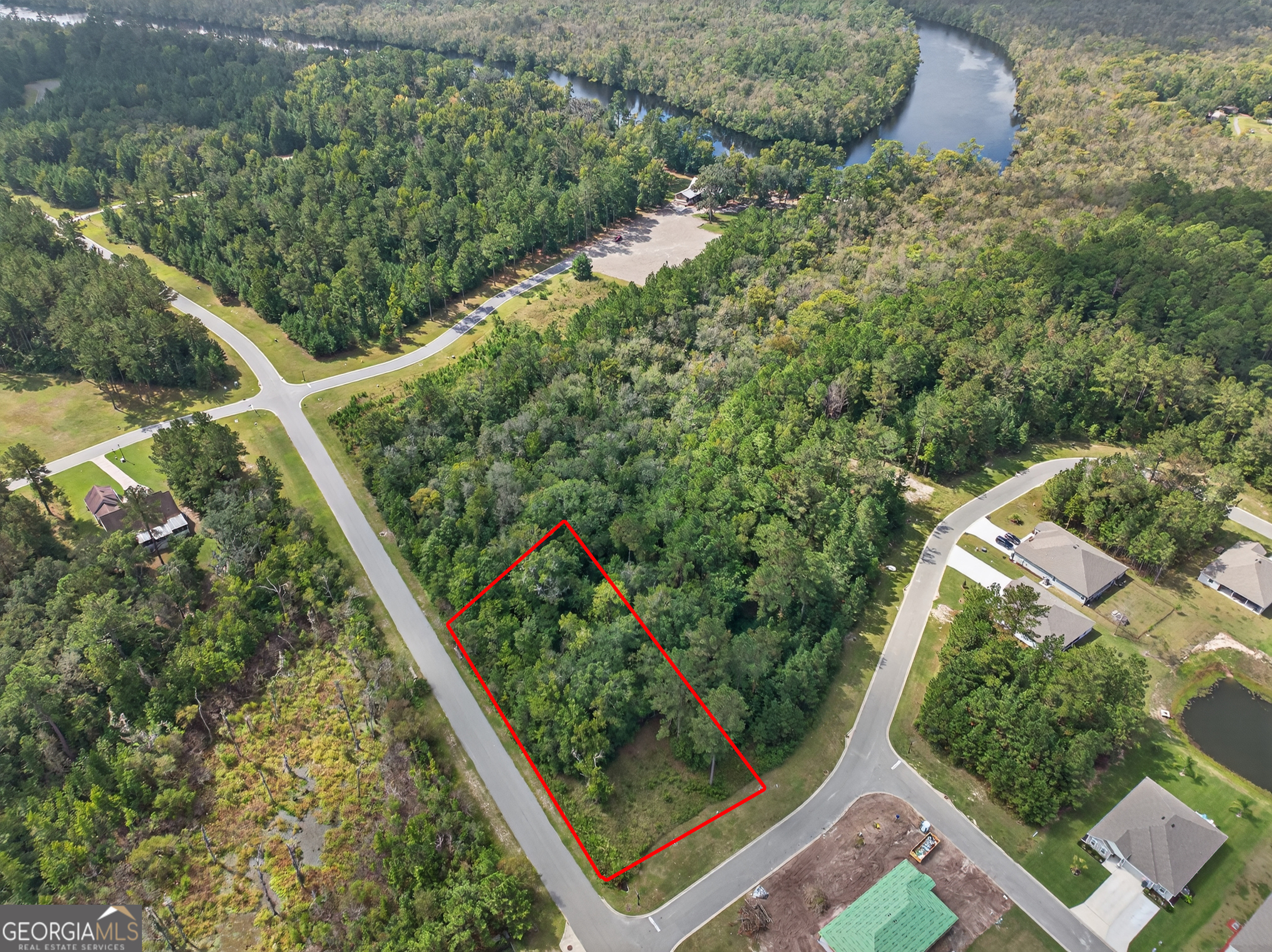 615 Breakwater Loop Kingsland, GA 31548 - Photo 7 of 25 an aerial view of a residential houses with yard