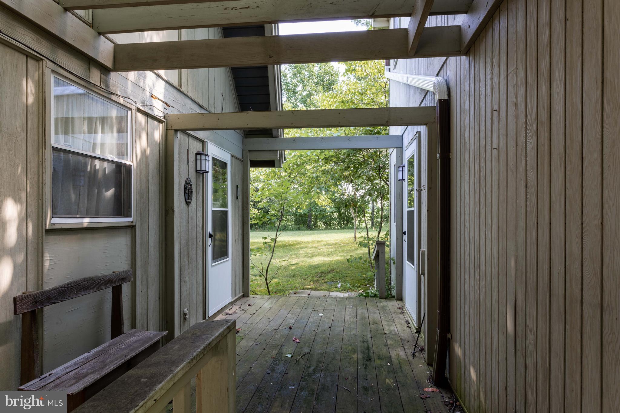 263 Tiger Valley Road Washington, VA 22747 - Photo 21 of 48 A breezeway connects the two homes
