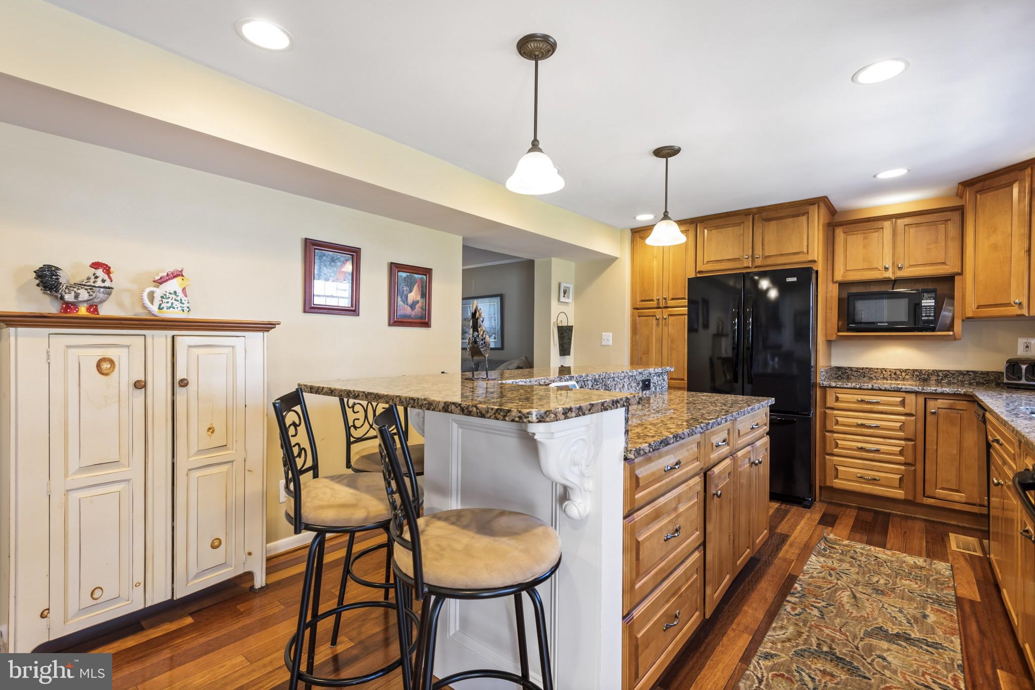 421 Bathurst Road Baltimore, MD 21228 - Photo 5 of 31 Custom kitchen with granite island