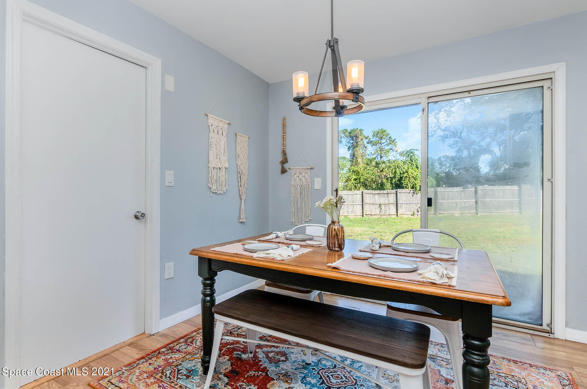 6921 Bentley Road Cocoa, FL 32927 - Photo 9 of 26 a view of a dining room with furniture window and outside view