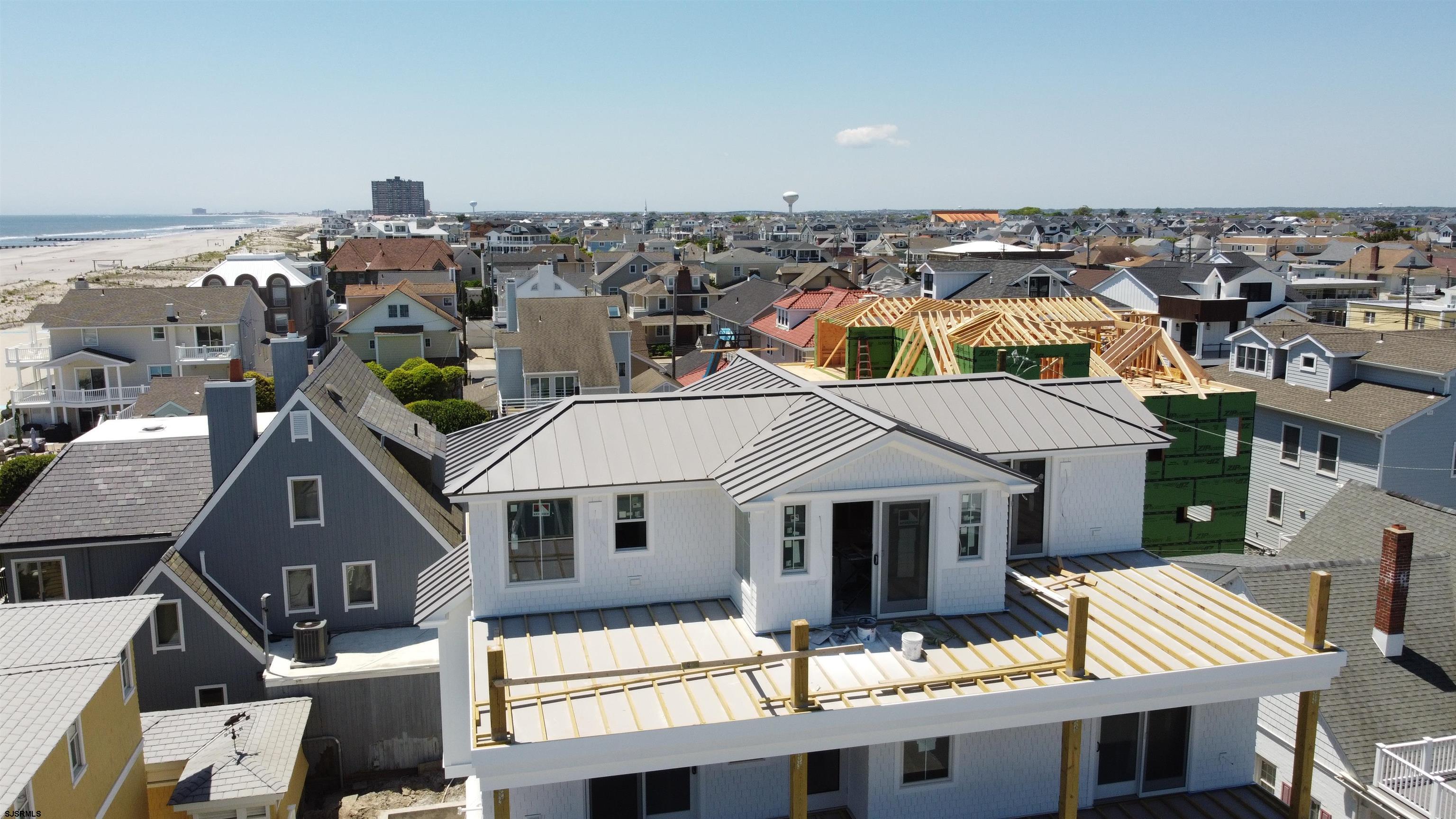 108 South Exeter Avenue Margate City, NJ 08402 - Photo 12 of 42 an aerial view of a house with a yard