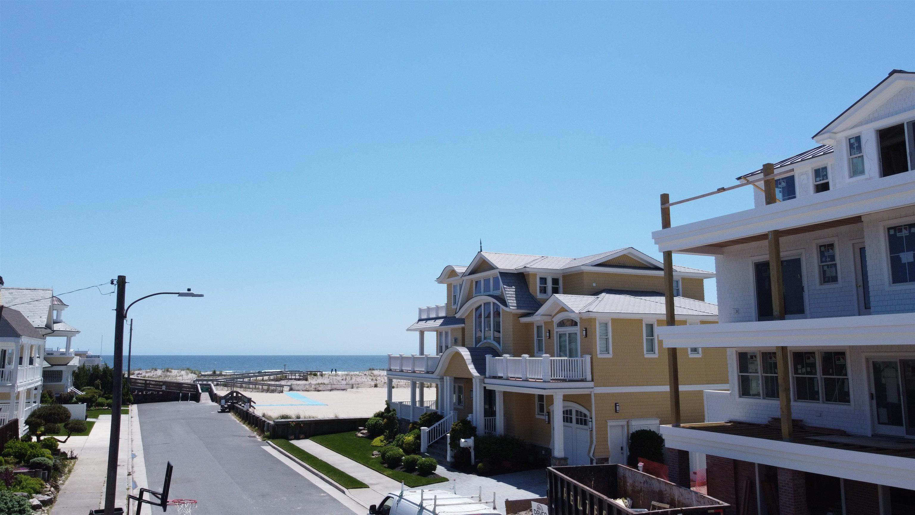 108 South Exeter Avenue Margate City, NJ 08402 - Photo 28 of 42 a front view of a building with glass windows