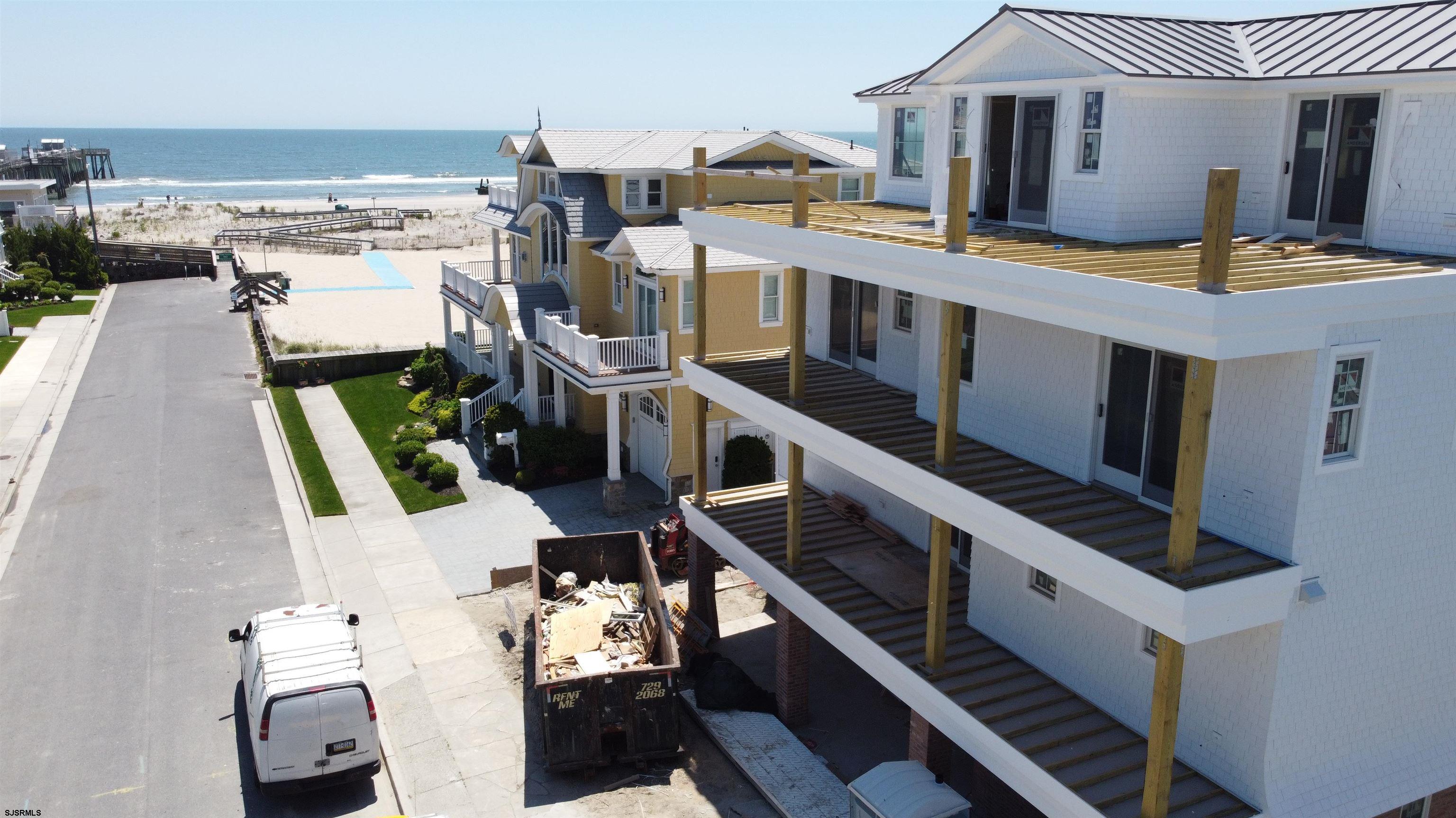 108 South Exeter Avenue Margate City, NJ 08402 - Photo 30 of 42 a view of a house with wooden floor and outdoor seating