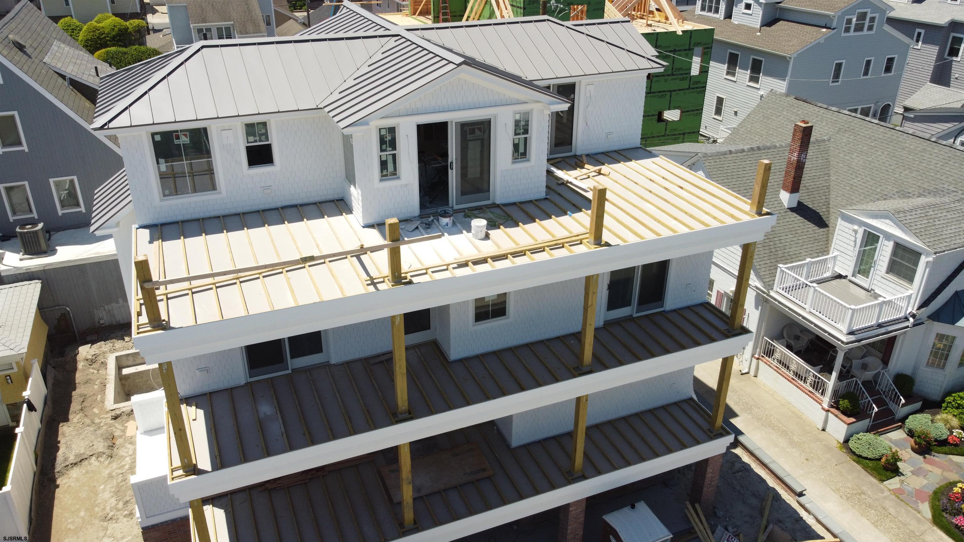 108 South Exeter Avenue Margate City, NJ 08402 - Photo 3 of 42 a view of a house with wooden fence