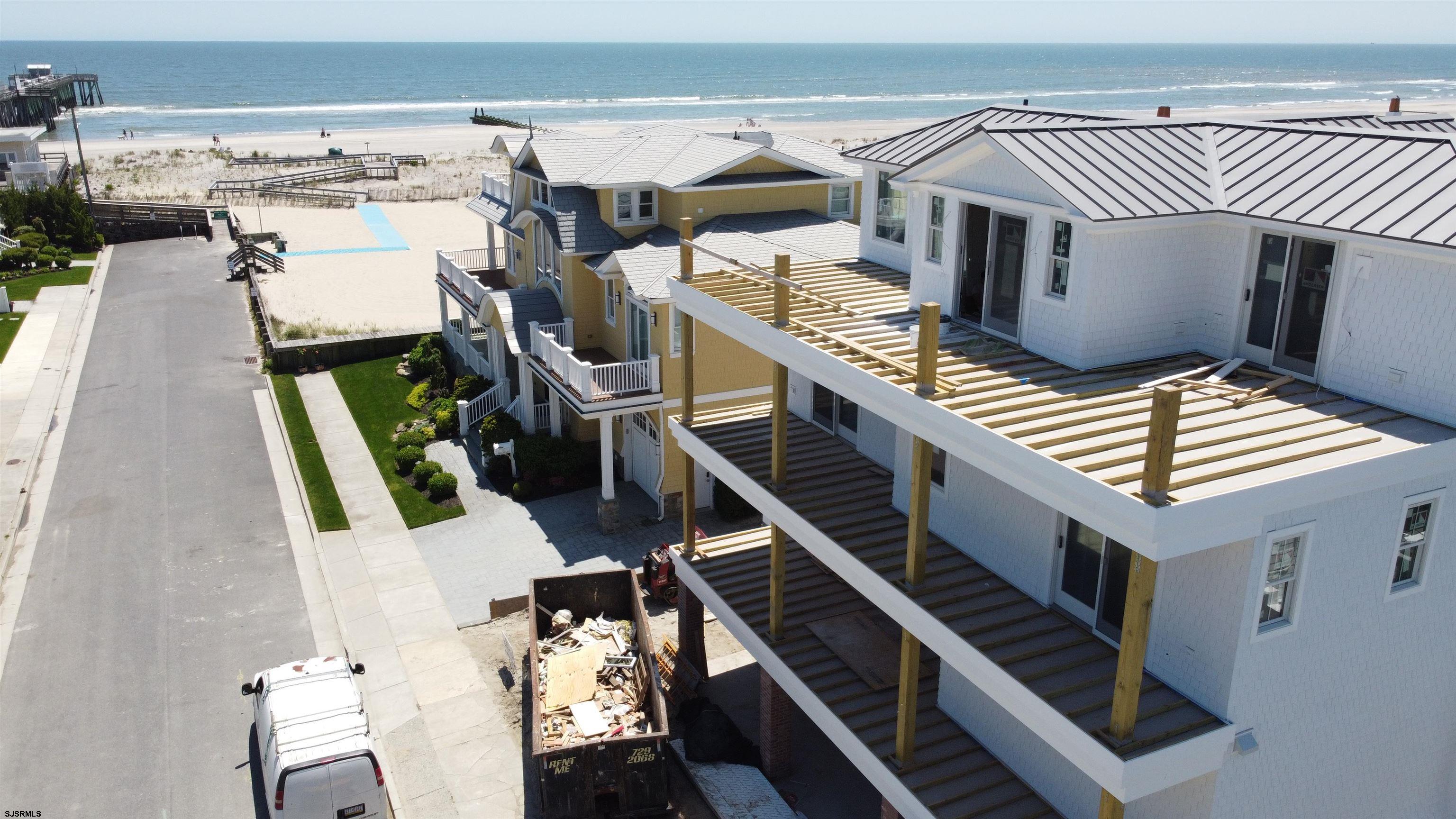 108 South Exeter Avenue Margate City, NJ 08402 - Photo 33 of 42 an aerial view of a house with wooden stairs and deck