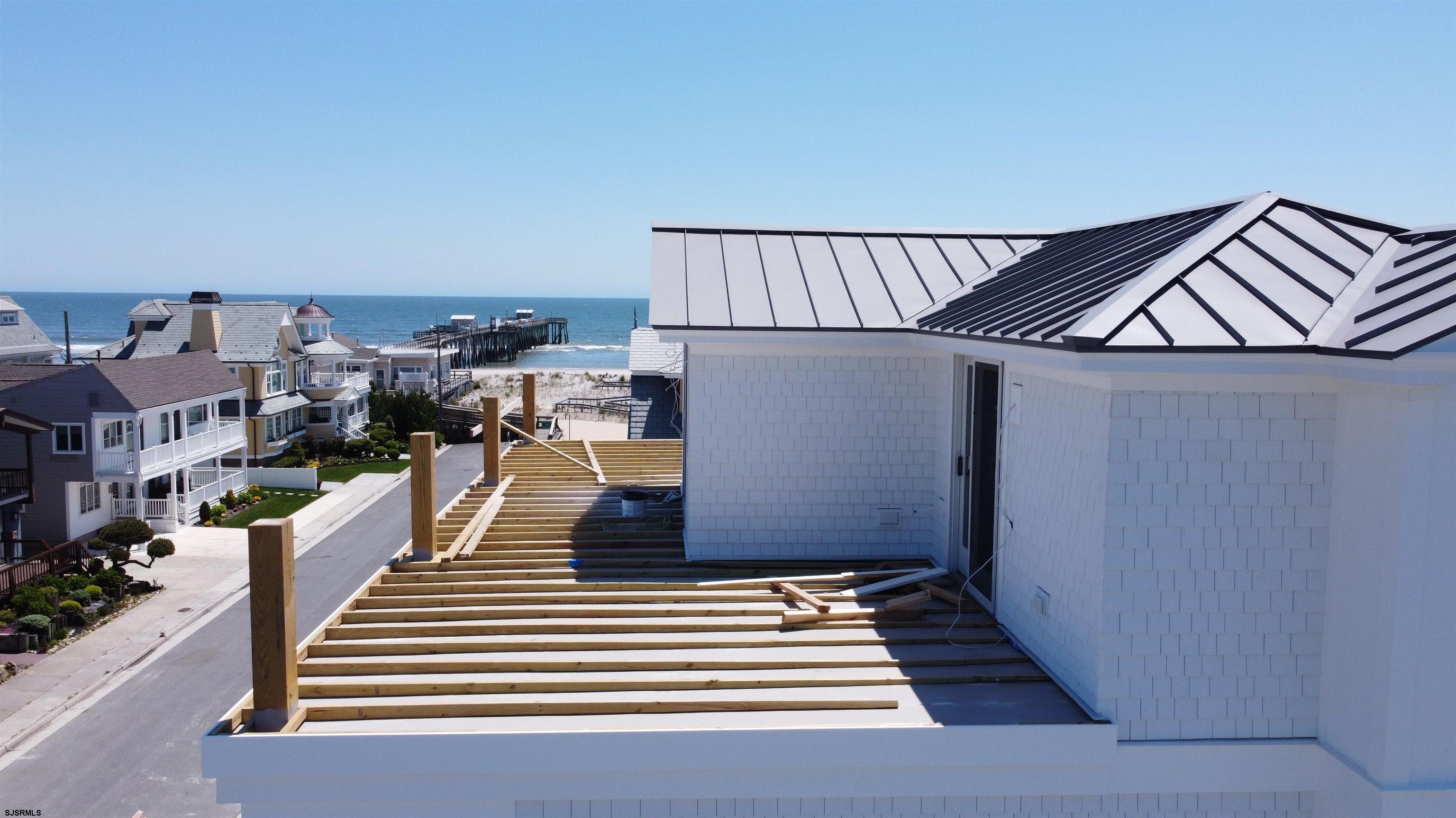 108 South Exeter Avenue Margate City, NJ 08402 - Photo 37 of 42 a view of entryway and hall with wooden floor