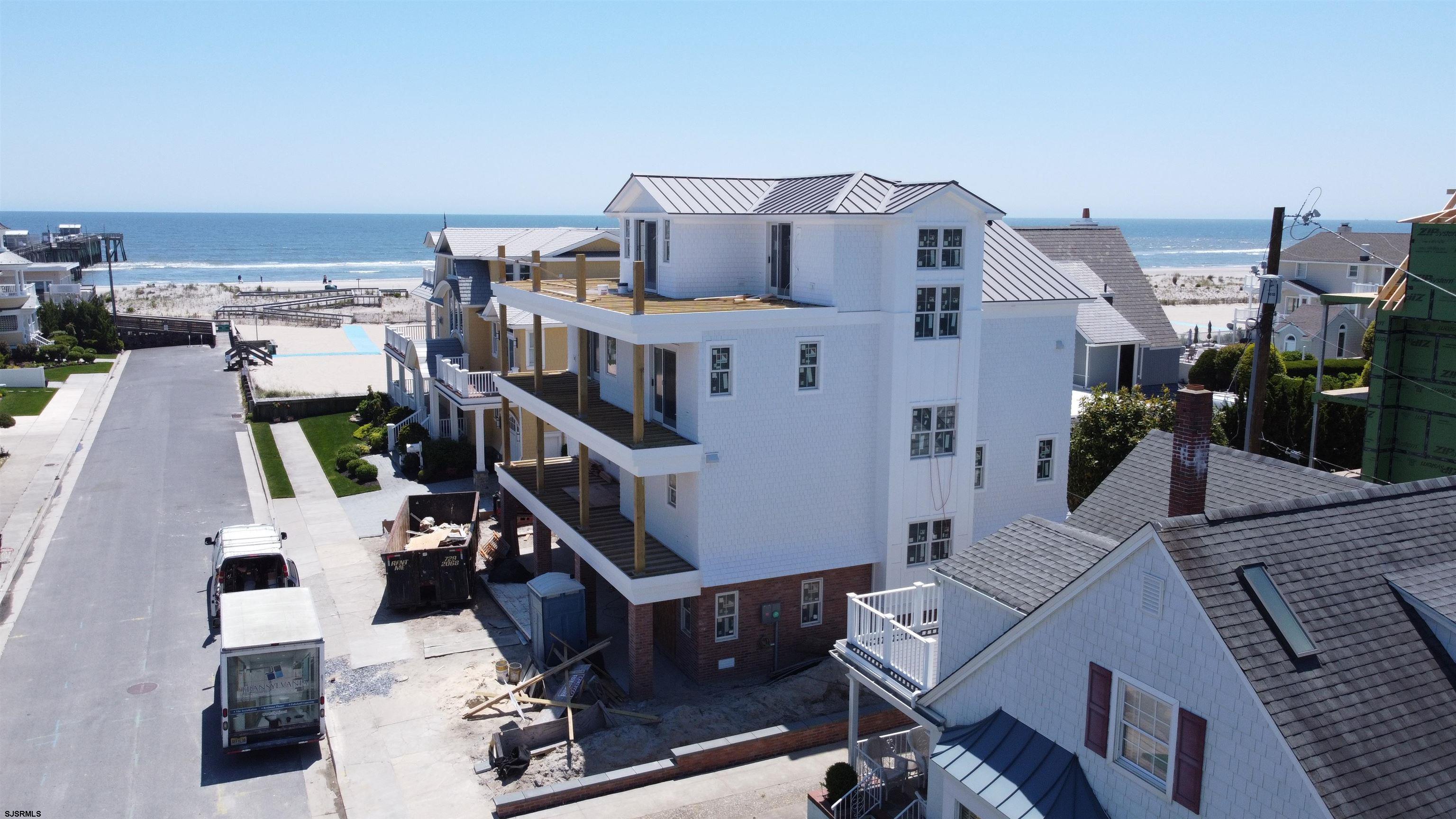108 South Exeter Avenue Margate City, NJ 08402 - Photo 5 of 42 a living room with furniture and a flat screen tv