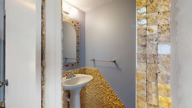 walk in closet with wooden floor