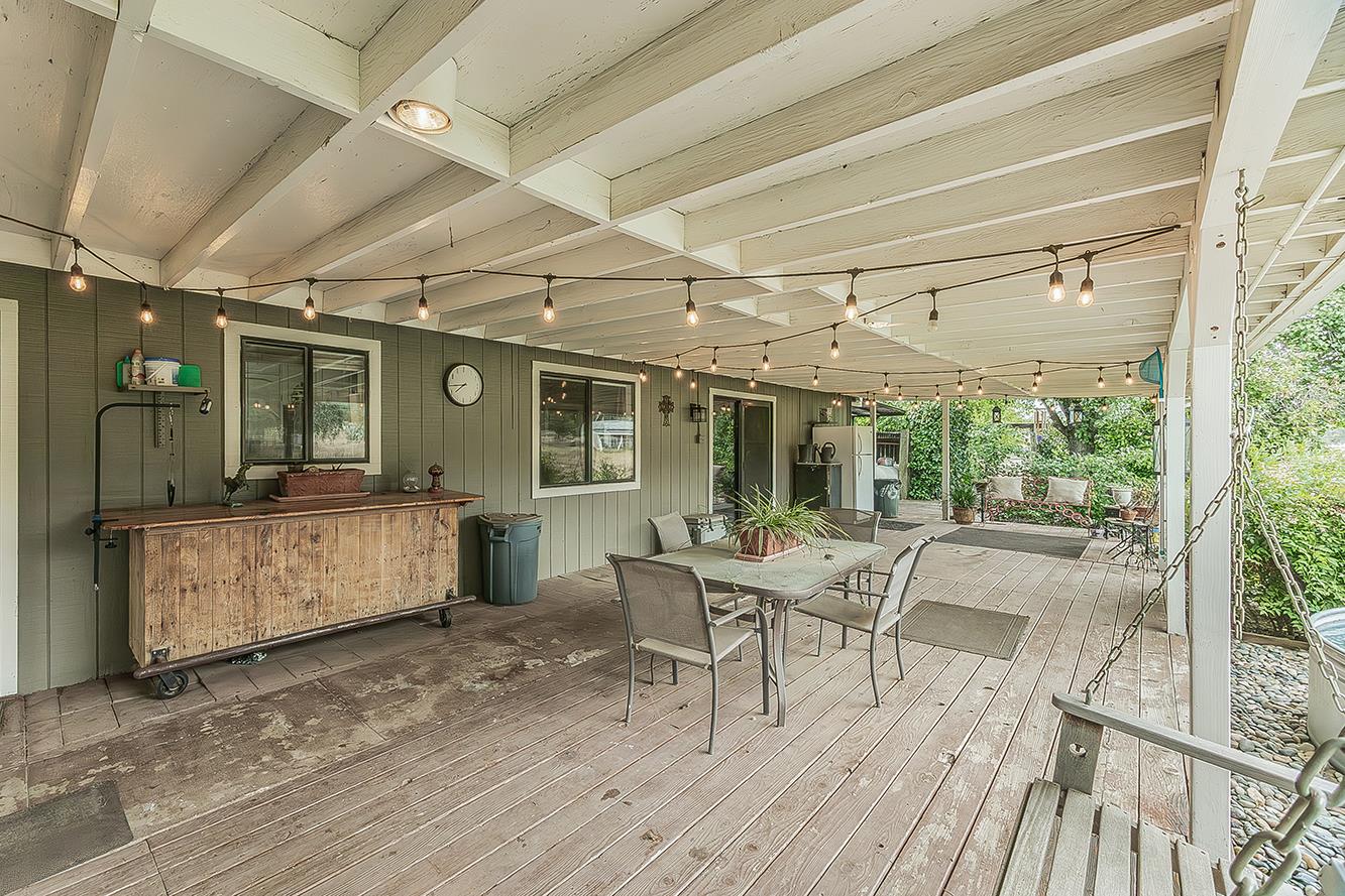 29545 Oak Meadow Road Tollhouse, CA 93667 - Photo 39 of 69 a view of a patio with table and chairs