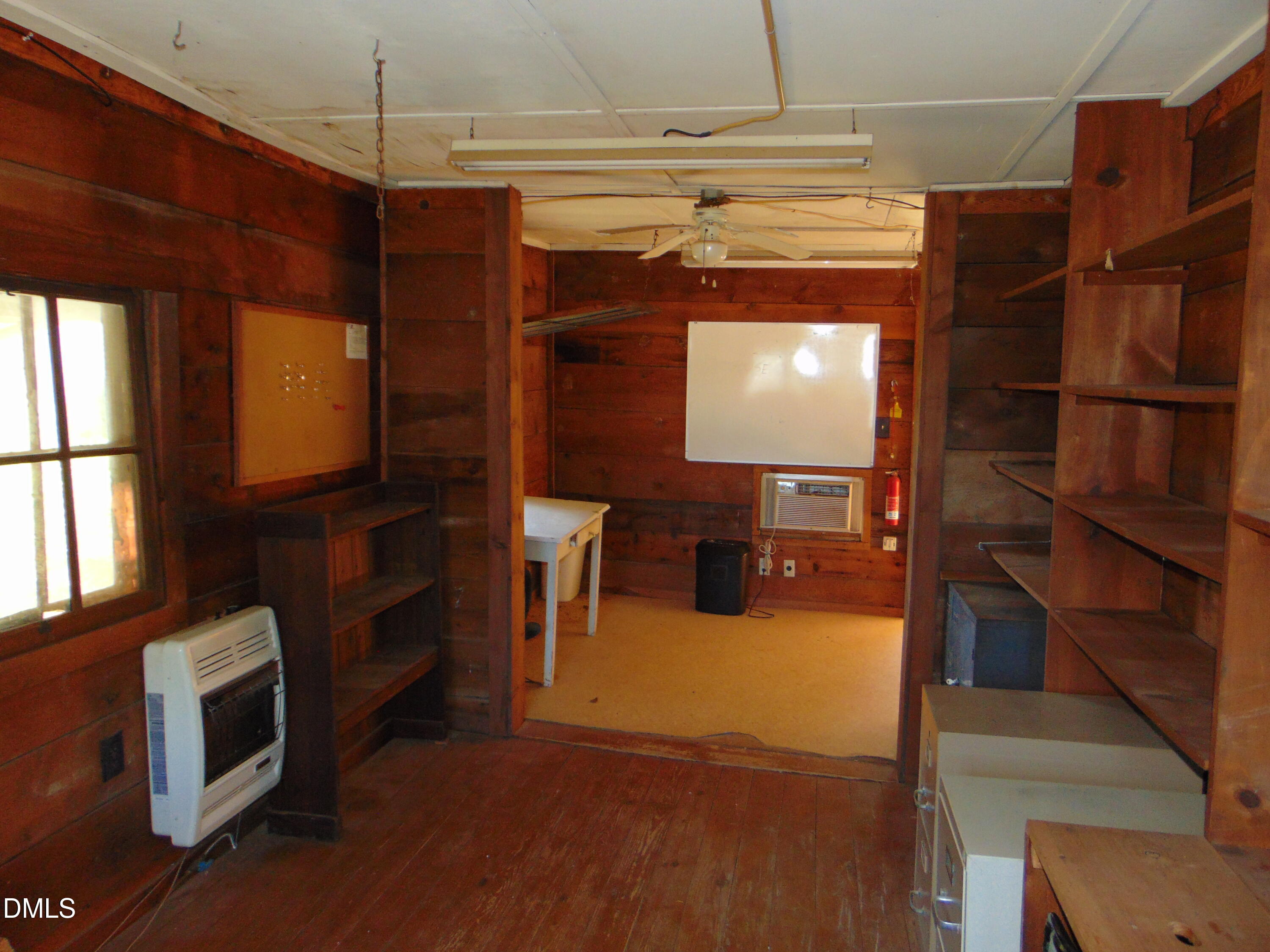 4067 Chewning Road Oxford, NC 27565 - Photo 60 of 82 a view of a livingroom with furniture and staircase