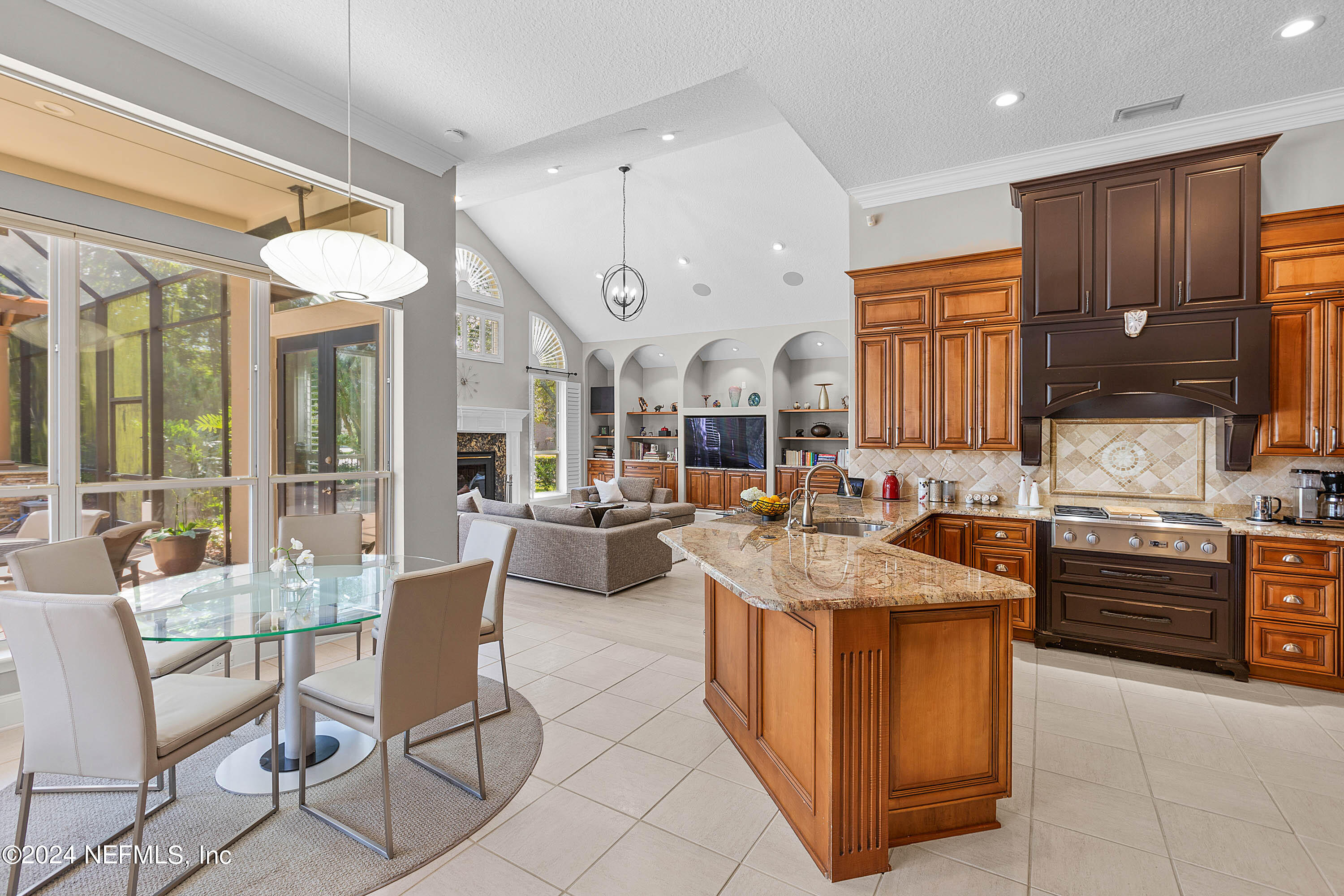 9975 Vineyard Lake Road East Jacksonville, FL 32256 - Photo 17 of 57 a kitchen with stainless steel appliances granite countertop a sink and cabinets