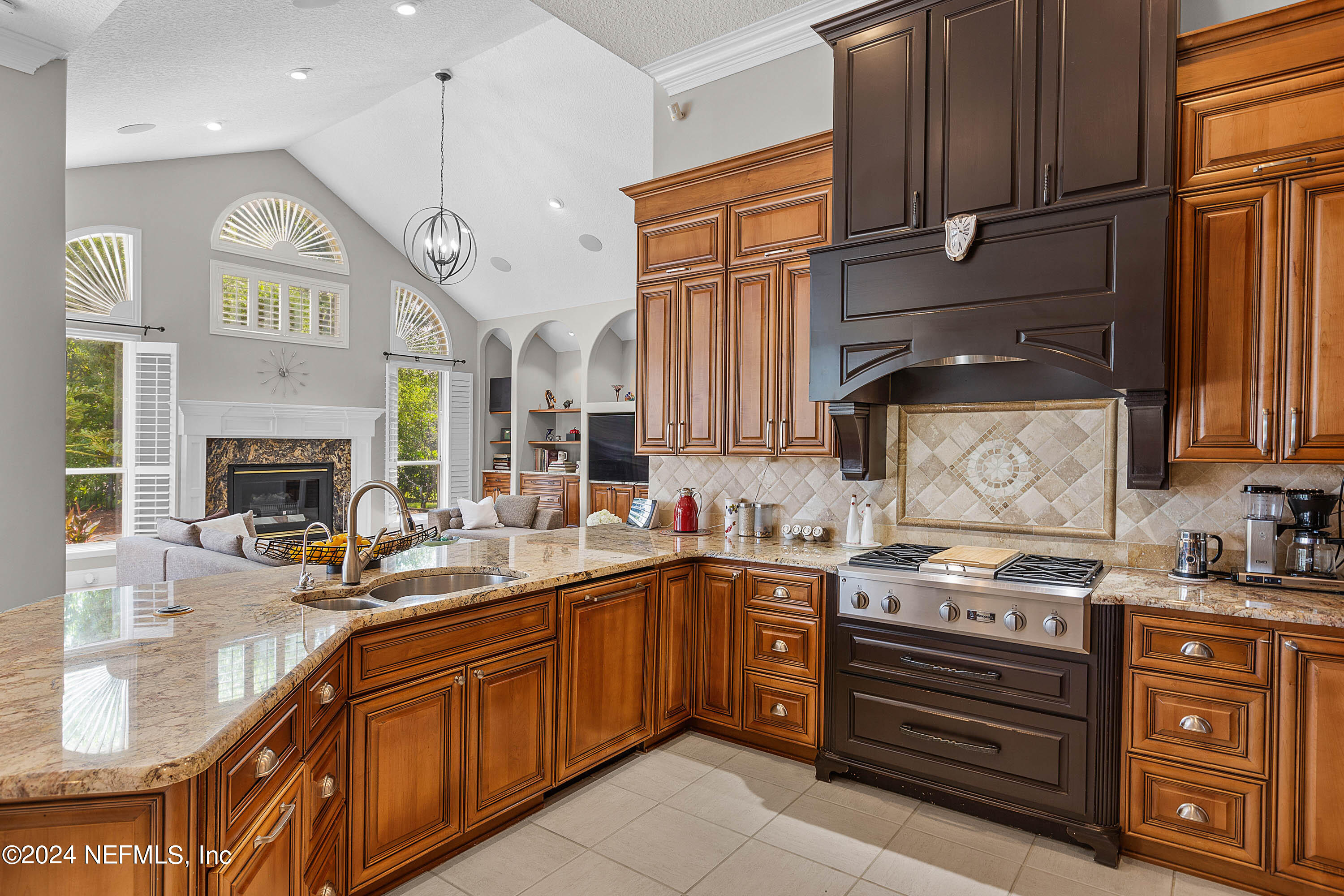 9975 Vineyard Lake Road East Jacksonville, FL 32256 - Photo 19 of 57 a kitchen with a sink stove and cabinets