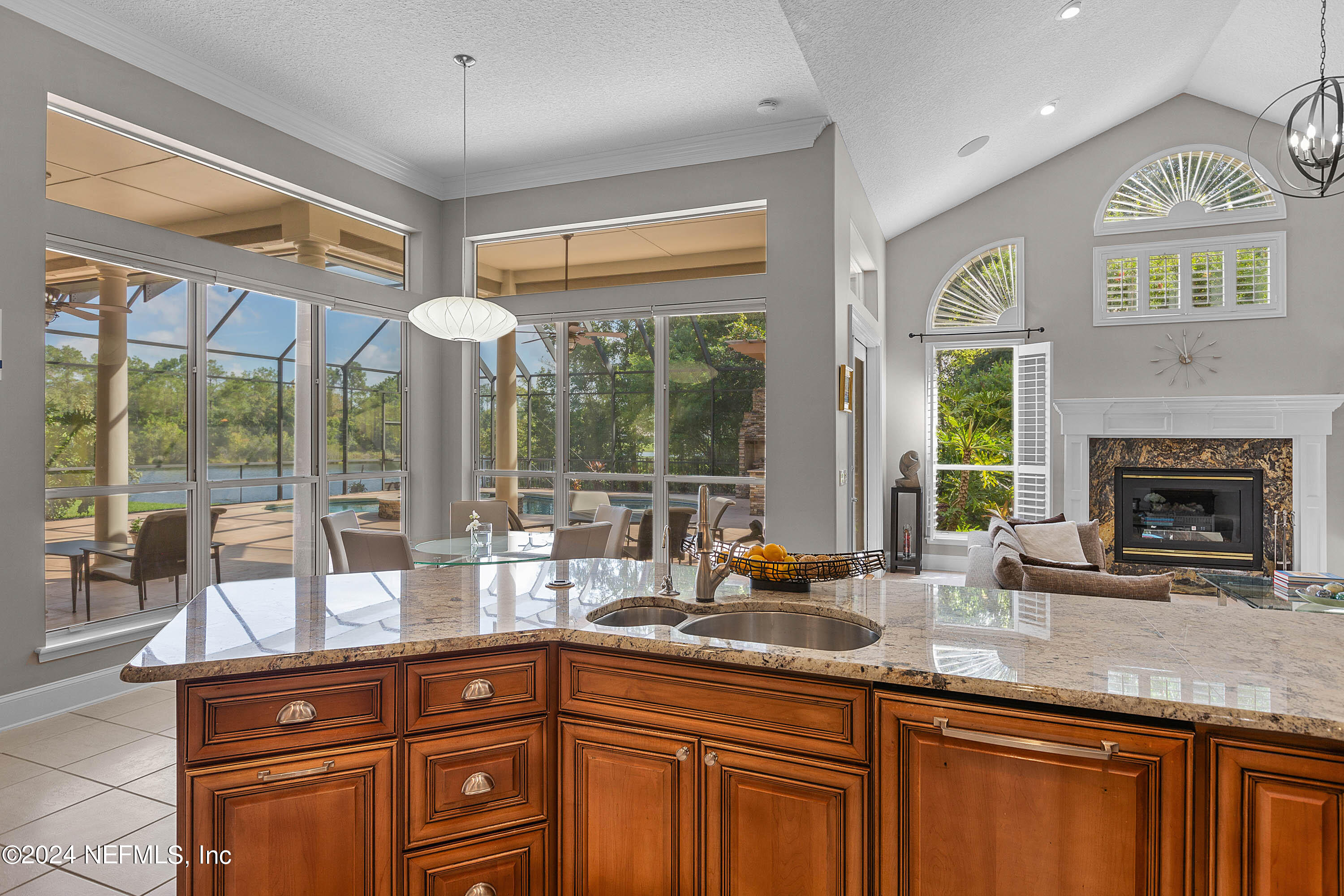 9975 Vineyard Lake Road East Jacksonville, FL 32256 - Photo 20 of 57 a kitchen with stainless steel appliances granite countertop a stove and a sink