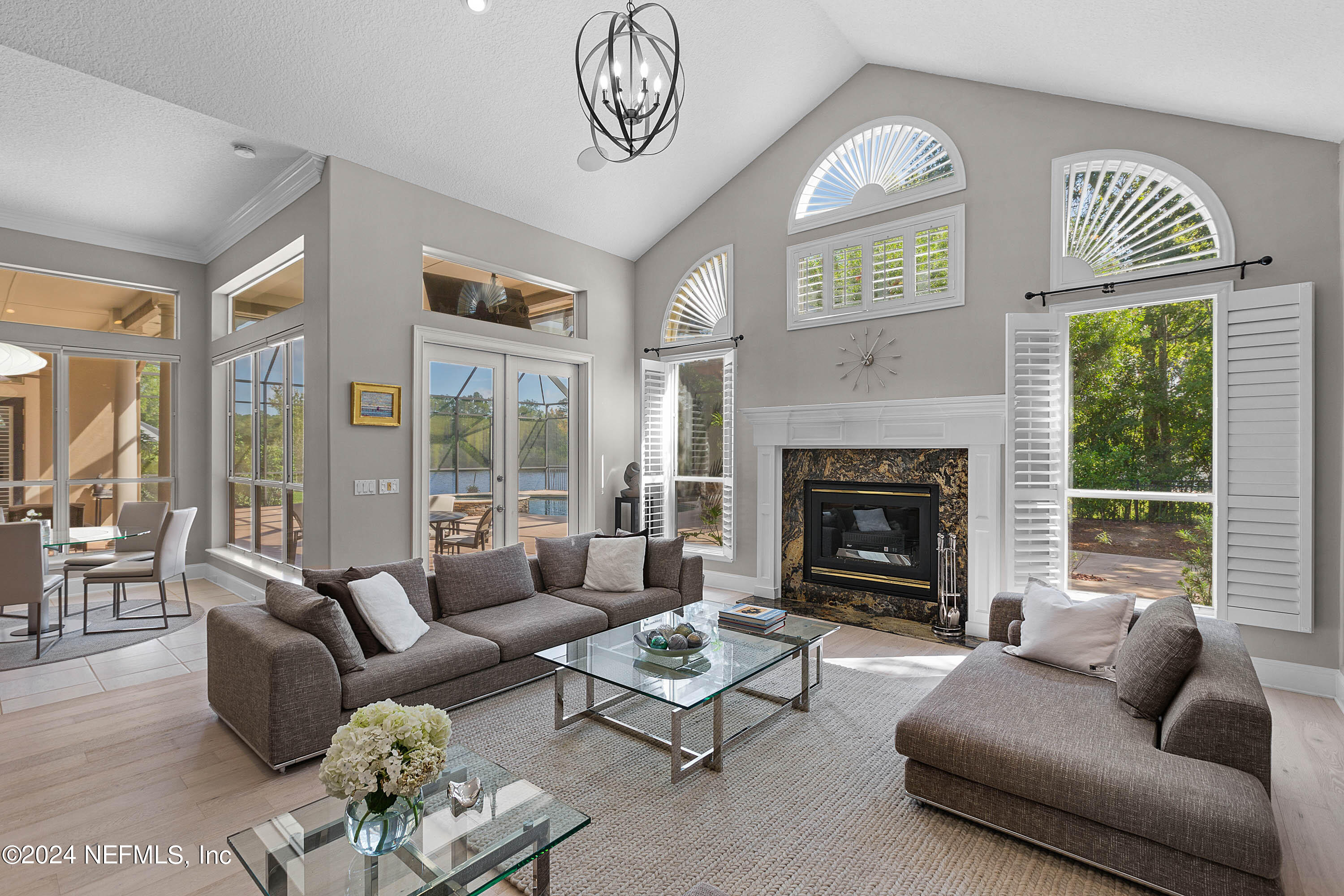 9975 Vineyard Lake Road East Jacksonville, FL 32256 - Photo 26 of 57 a living room with furniture fireplace and window