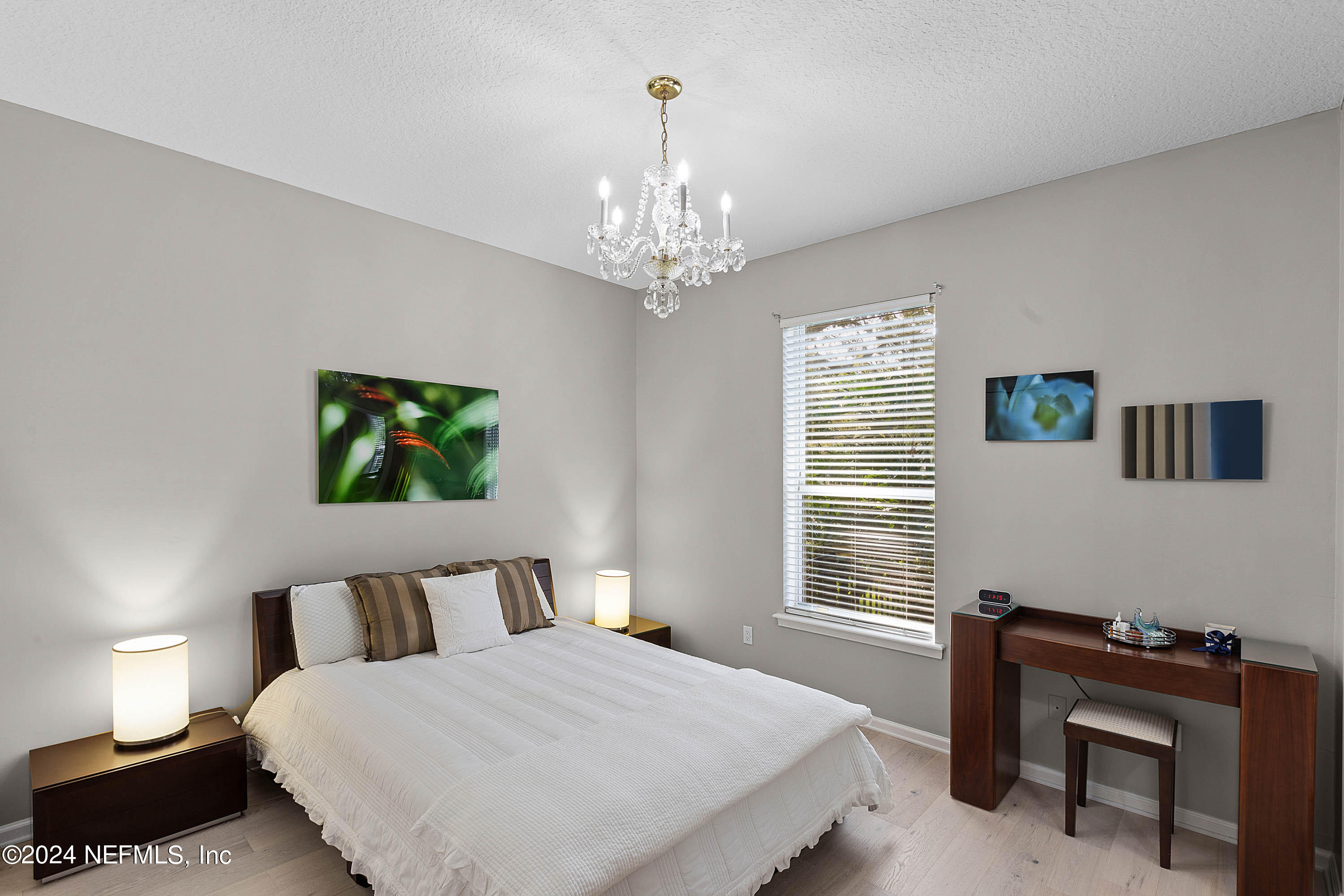 9975 Vineyard Lake Road East Jacksonville, FL 32256 - Photo 29 of 57 a bedroom with bed and a window