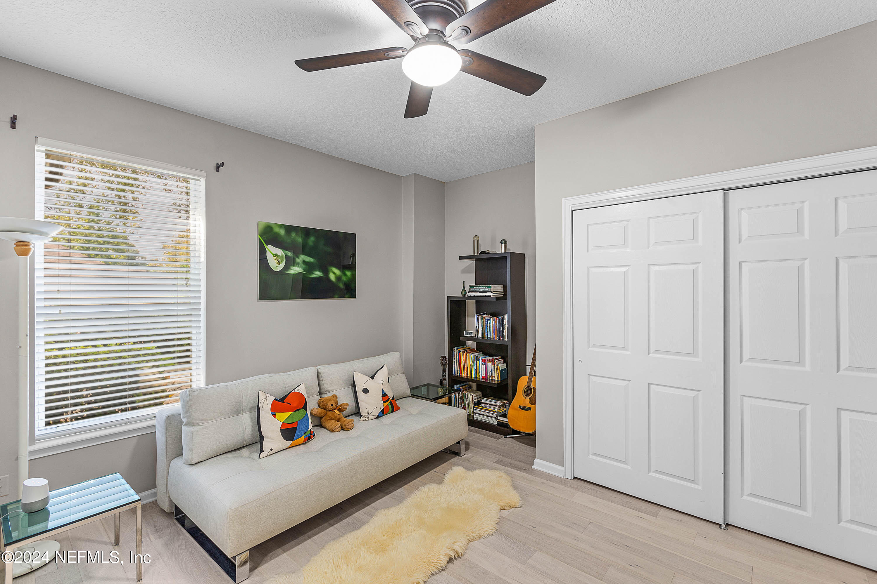 9975 Vineyard Lake Road East Jacksonville, FL 32256 - Photo 33 of 57 a living room with furniture and a window