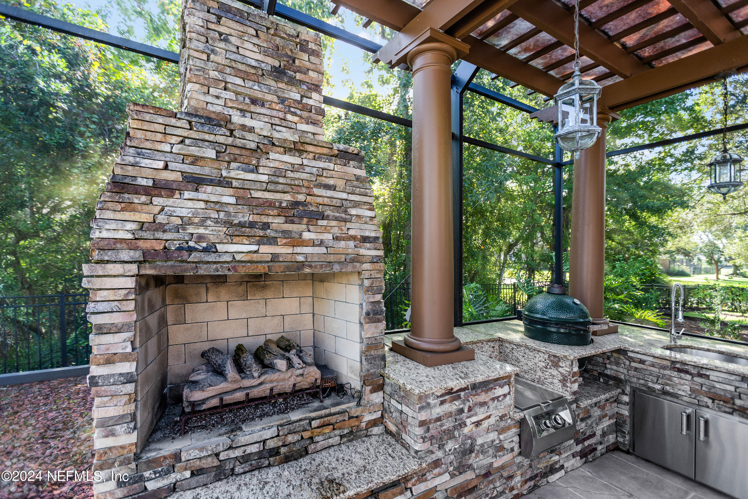 9975 Vineyard Lake Road East Jacksonville, FL 32256 - Photo 45 of 57 a front view of a house with a garden