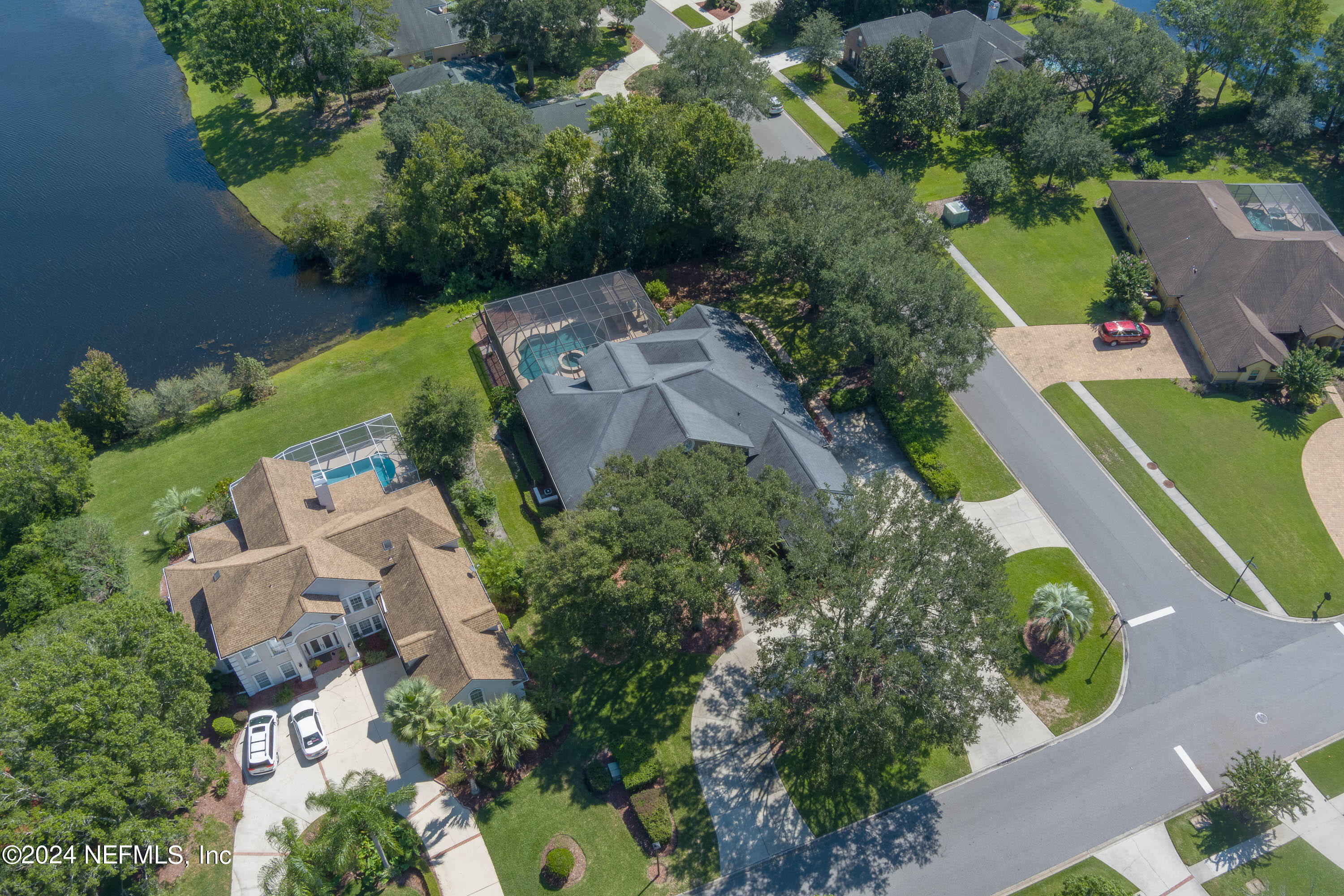 9975 Vineyard Lake Road East Jacksonville, FL 32256 - Photo 56 of 57 an aerial view of a house with outdoor space and street view