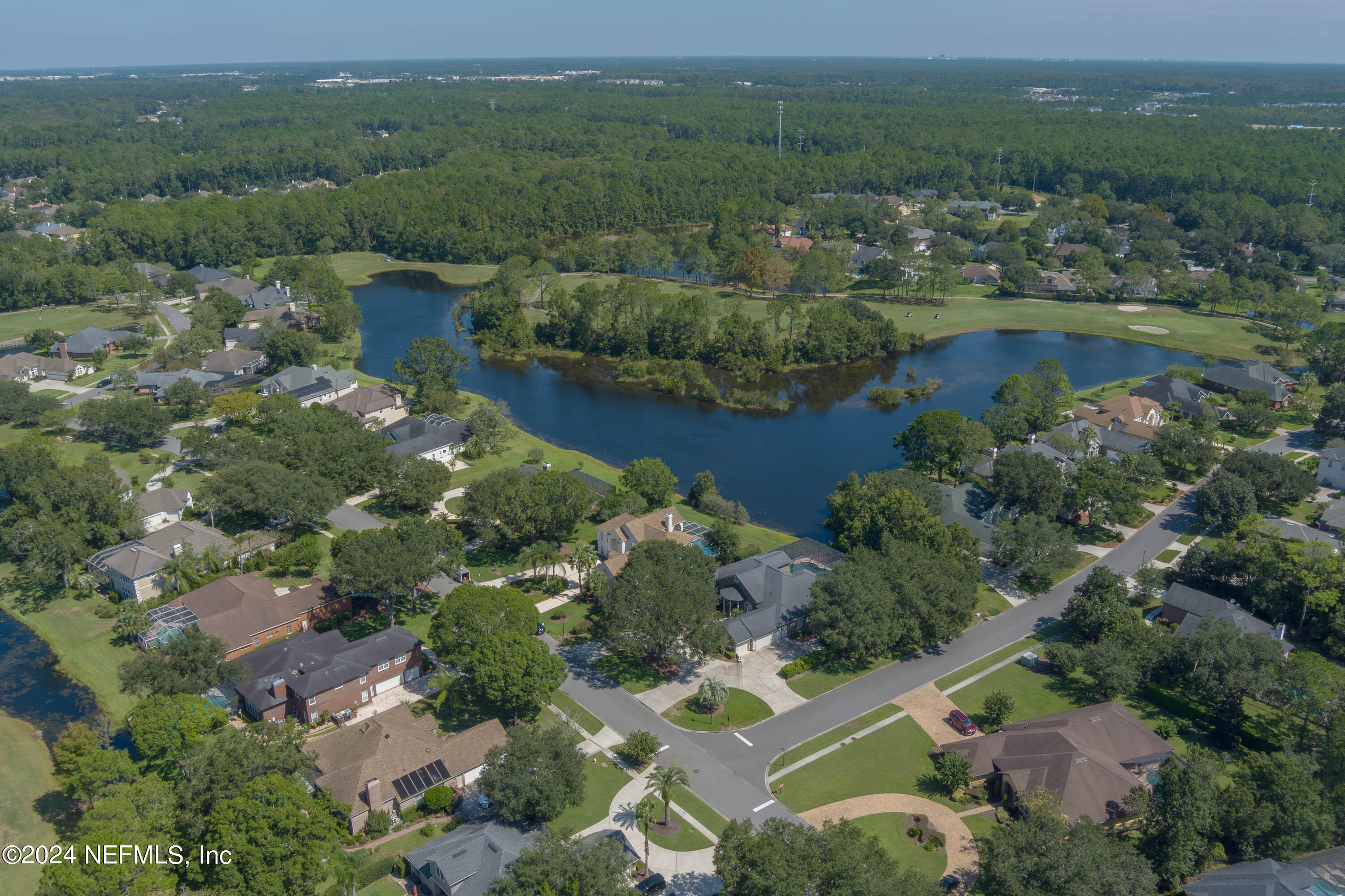 9975 Vineyard Lake Road East Jacksonville, FL 32256 - Photo 57 of 57 an aerial view of lake residential houses with outdoor space and trees