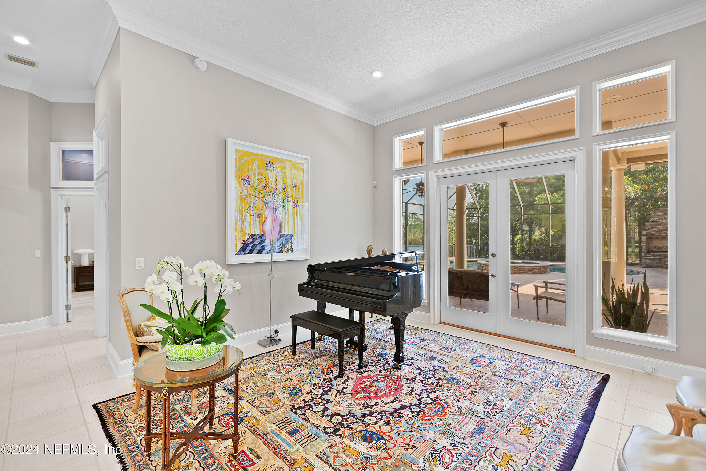 9975 Vineyard Lake Road East Jacksonville, FL 32256 - Photo 6 of 57 a living room with furniture a window and a rug