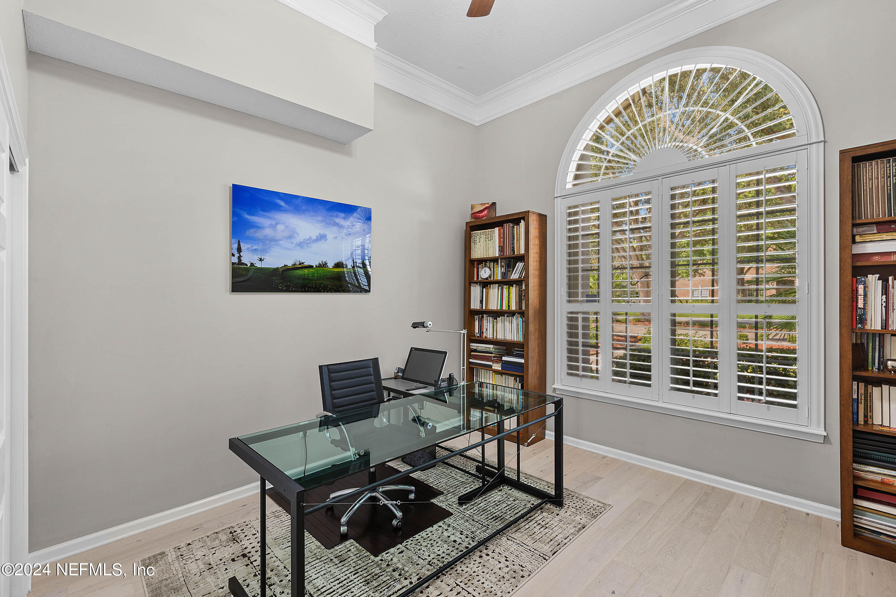 9975 Vineyard Lake Road East Jacksonville, FL 32256 - Photo 9 of 57 a view of a workspace with furniture and a window