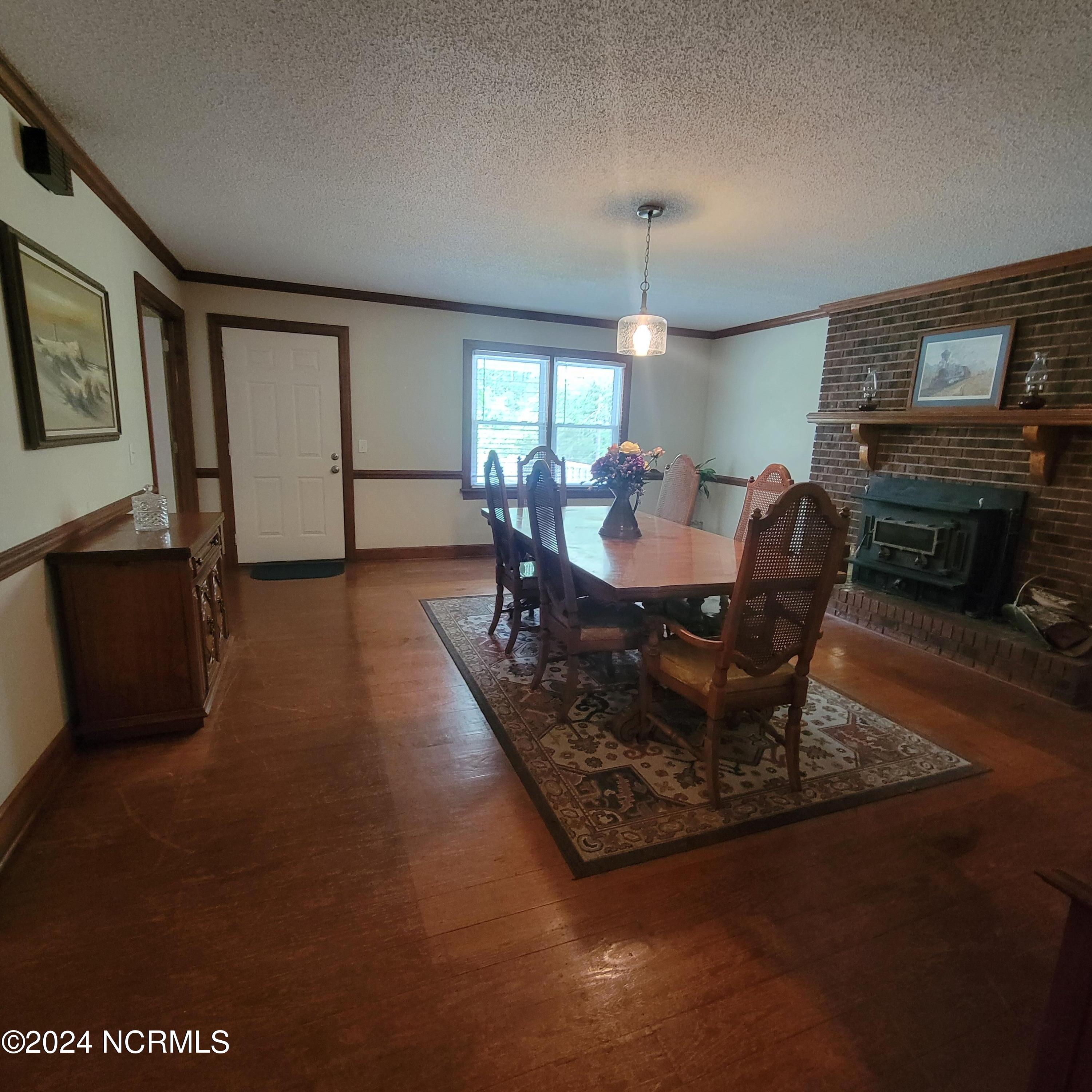 6081 Hoyt Road Middlesex, NC 27557 - Photo 17 of 59 Formal.Dining.with.Fireplace