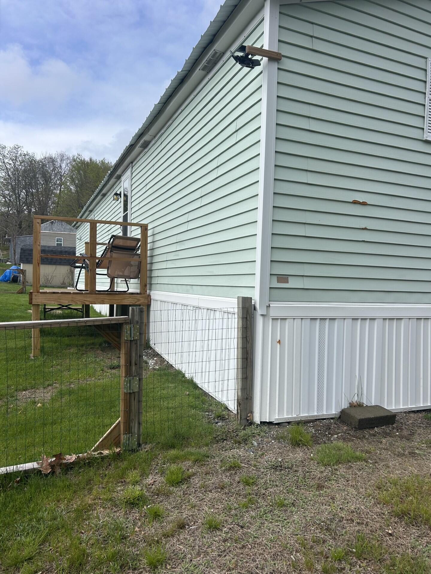 384 Main Street, Unit 16 Jay, ME 04239 - Photo 8 of 9 0419 rear sm. deck