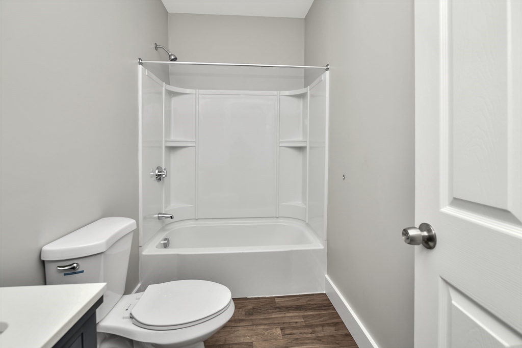 1903 Columbus Avenue Boston, MA 02119 - Photo 6 of 11 a bathroom with a toilet and shower