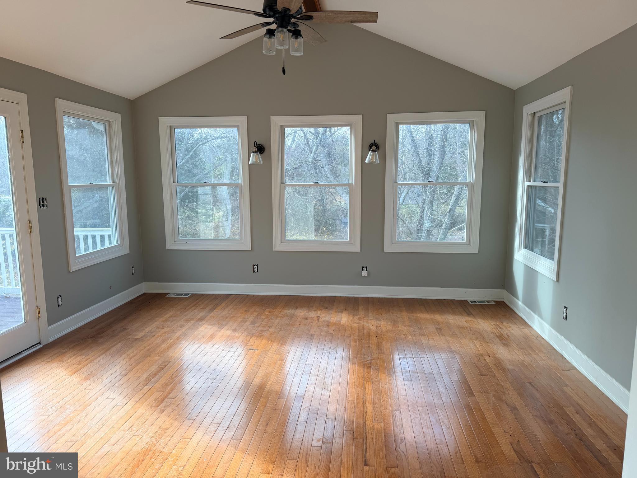 719 Kettle Run Road Marlton, NJ 08053 - Photo 10 of 18 a view of a livingroom with wooden floor and a window
