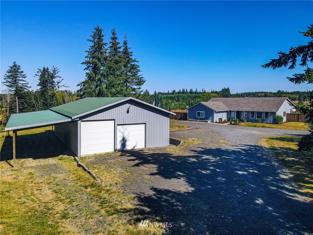 134 Mountain Sun Road Chehalis, WA 98532 - Photo 3 of 40 a front view of a house with a yard