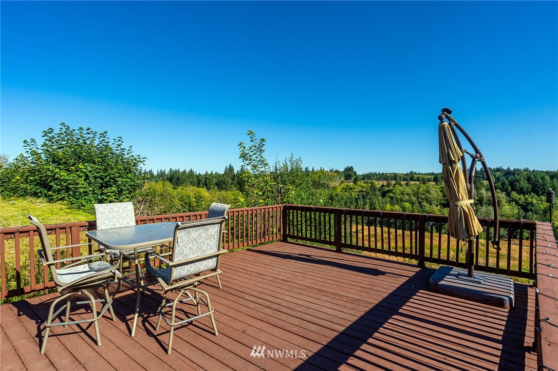 134 Mountain Sun Road Chehalis, WA 98532 - Photo 40 of 40 a view of a chairs and table on the wooden floor