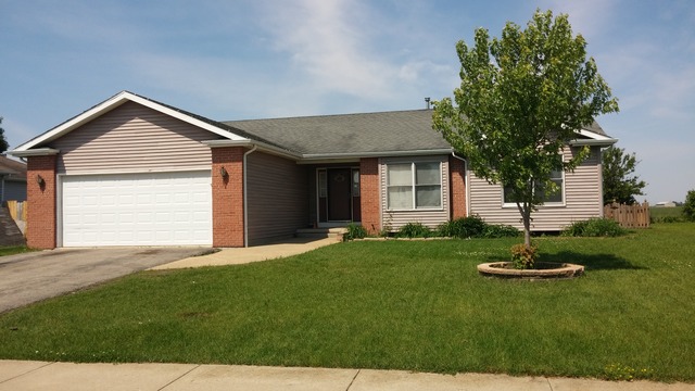 285 Rollin Road Somonauk, IL 60552 - Photo 1 of 25 a house view with a garden space