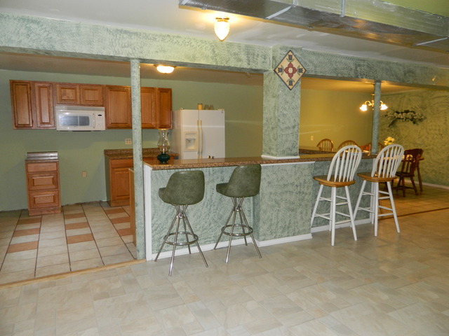 285 Rollin Road Somonauk, IL 60552 - Photo 21 of 25 a dining room with furniture and a rug