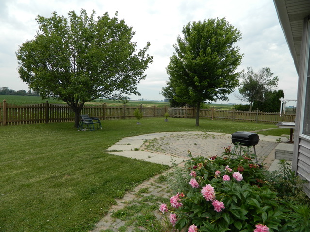 285 Rollin Road Somonauk, IL 60552 - Photo 25 of 25 a view of a garden with sitting area