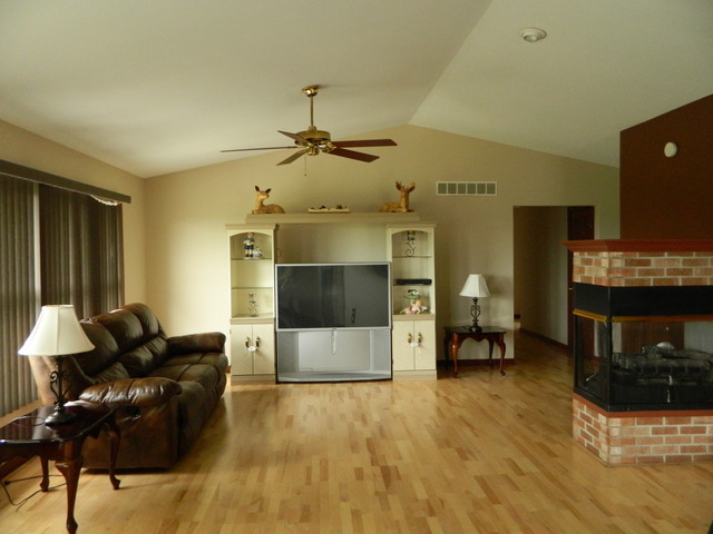 285 Rollin Road Somonauk, IL 60552 - Photo 4 of 25 a living room with furniture and a flat screen tv