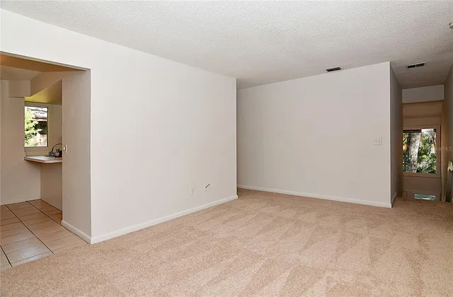 an empty room with windows