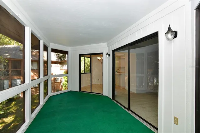 a view of an entryway with garden