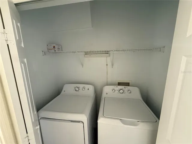 a utility room with dryer and washer