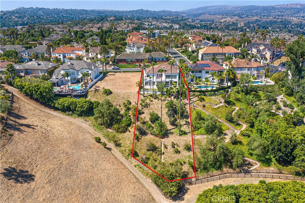 25191 Rockridge Road Laguna Hills, CA 92653 - Photo 3 of 33 an aerial view of residential houses with outdoor space
