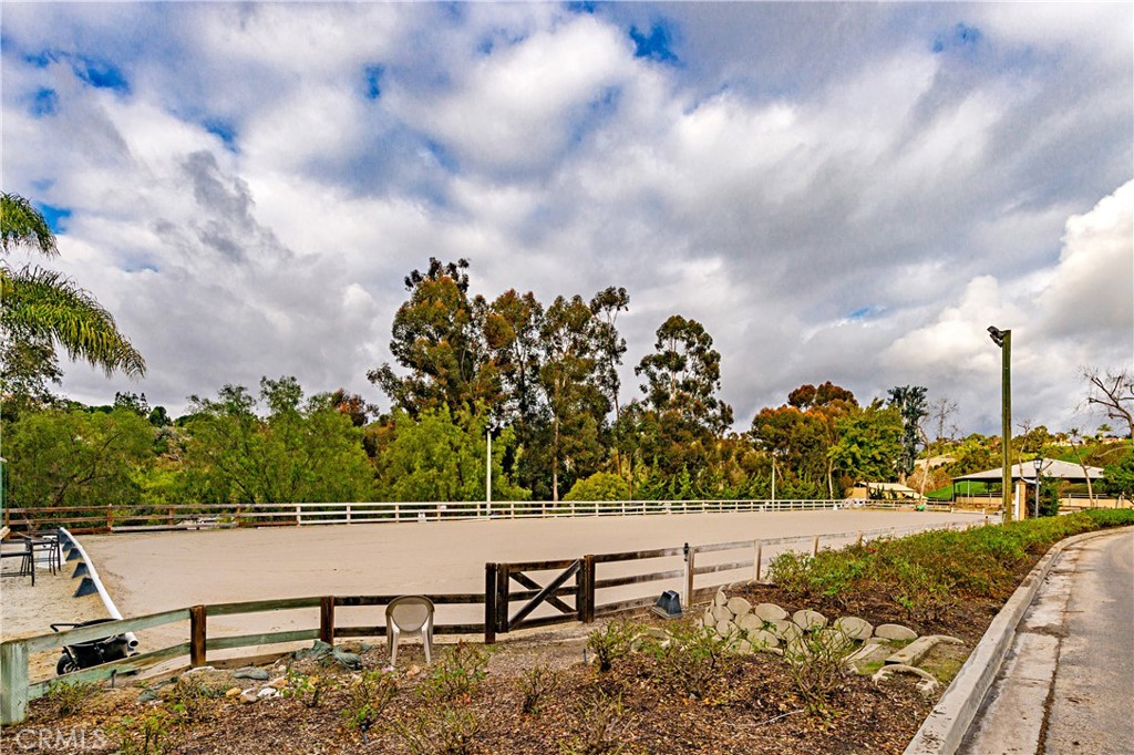 25191 Rockridge Road Laguna Hills, CA 92653 - Photo 31 of 33 a view of a bench in a yard next to a yard