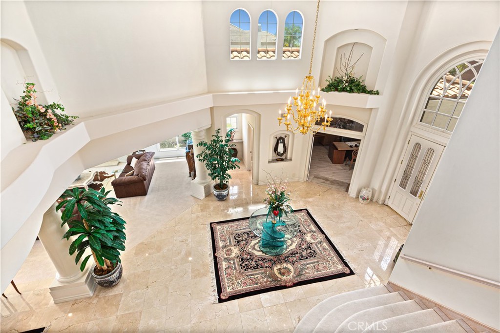 25191 Rockridge Road Laguna Hills, CA 92653 - Photo 7 of 33 a view of living room with furniture and flowers