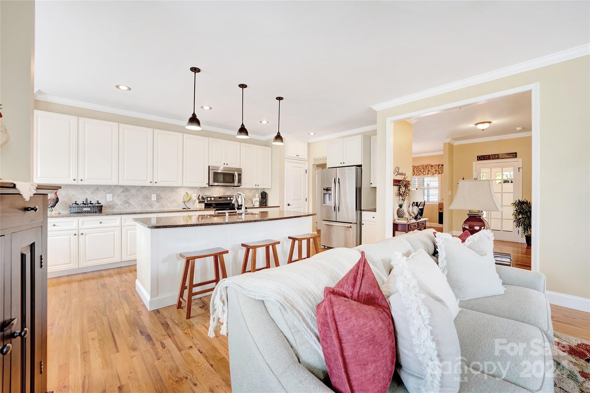 29 Willow Bend Candler, NC 28715 - Photo 12 of 45 a large white kitchen with cabinets