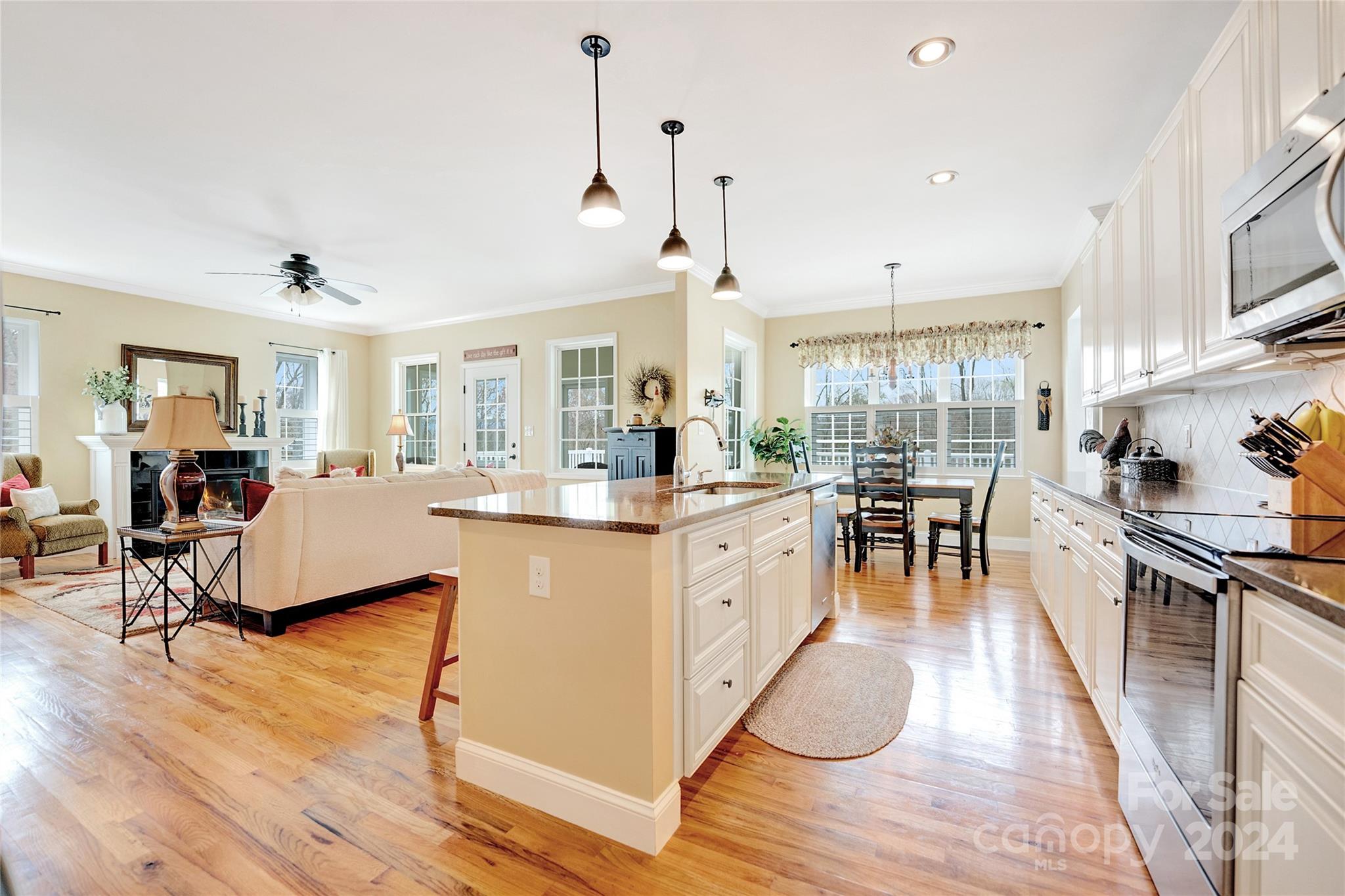 29 Willow Bend Candler, NC 28715 - Photo 13 of 45 a living room with stainless steel appliances granite countertop furniture wooden floor and a view of kitchen