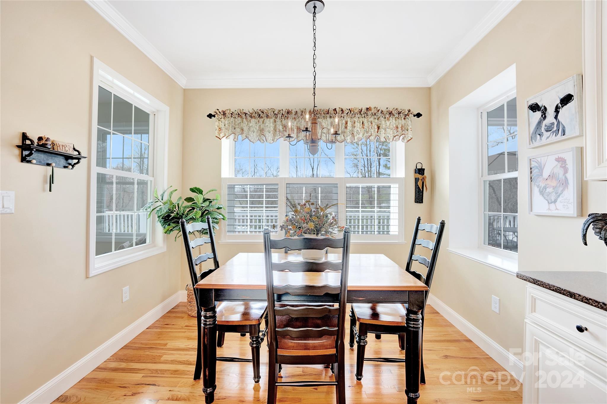 29 Willow Bend Candler, NC 28715 - Photo 17 of 45 a view of a dining room with furniture window and wooden floor