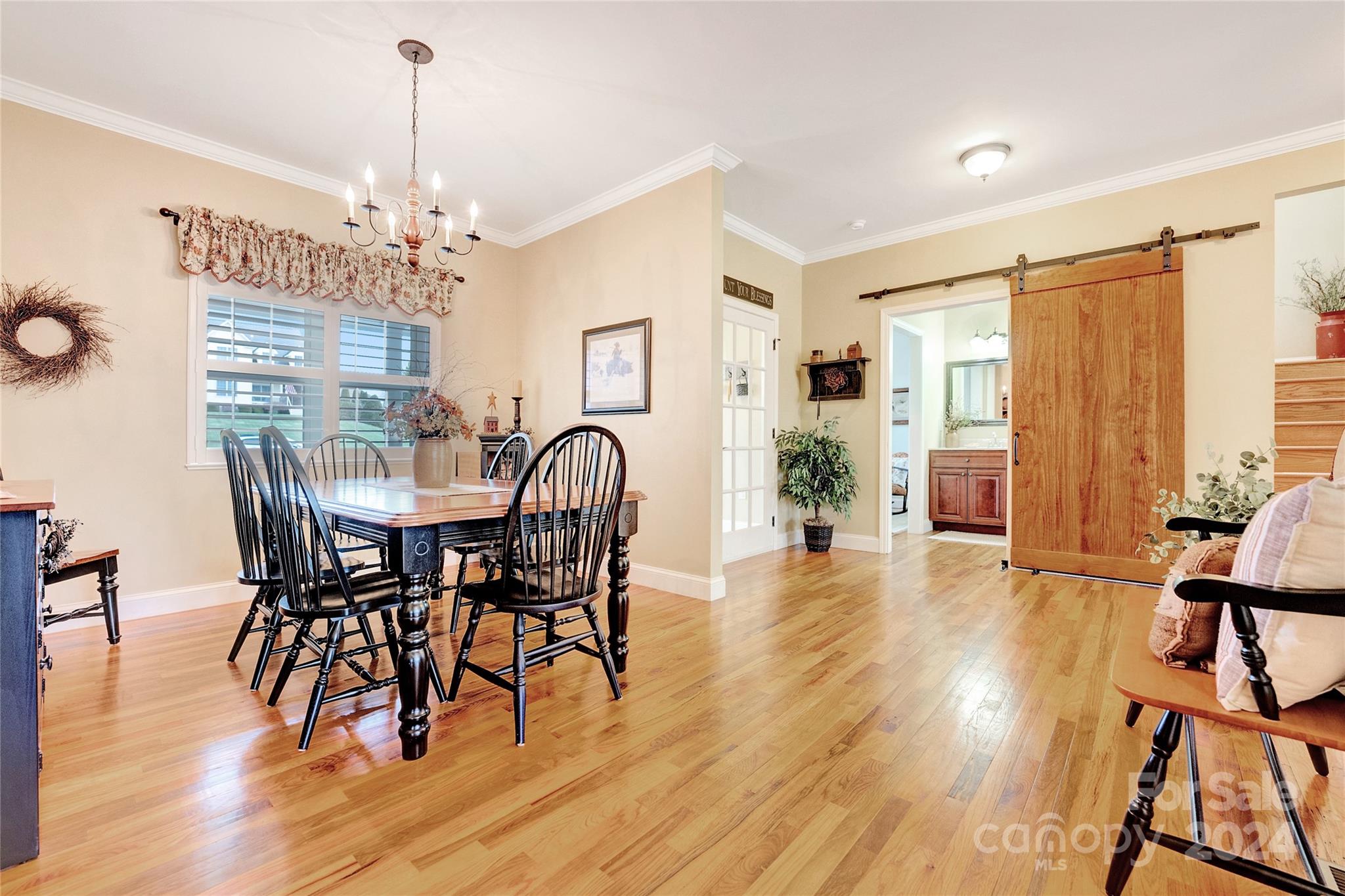 29 Willow Bend Candler, NC 28715 - Photo 18 of 45 a view of a dining room with furniture window and wooden floor