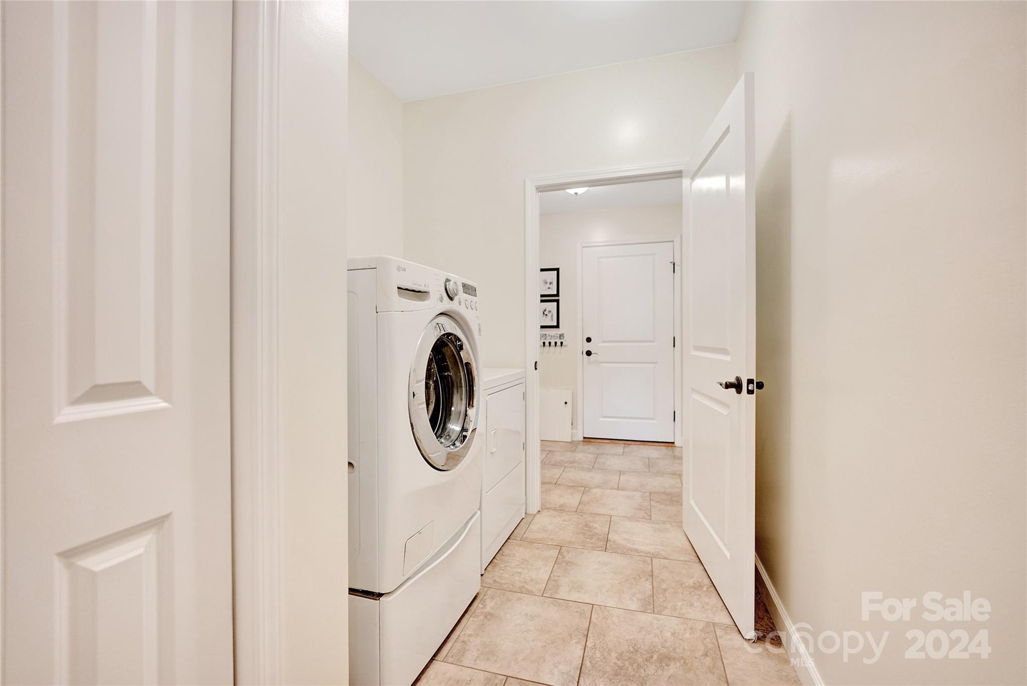 29 Willow Bend Candler, NC 28715 - Photo 21 of 45 a view of a storage & utility room with washer and dryer
