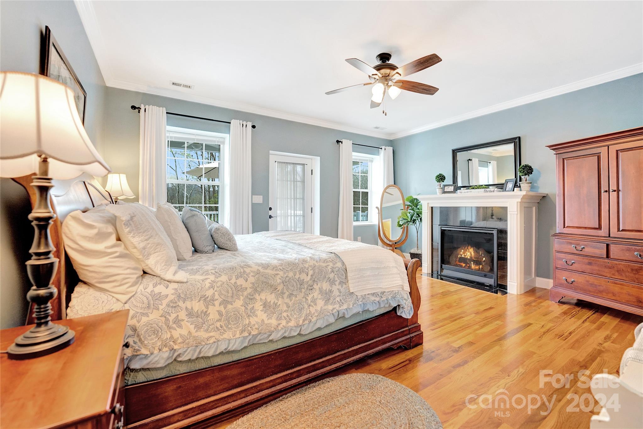 29 Willow Bend Candler, NC 28715 - Photo 22 of 45 a bed room with a bed and a fireplace