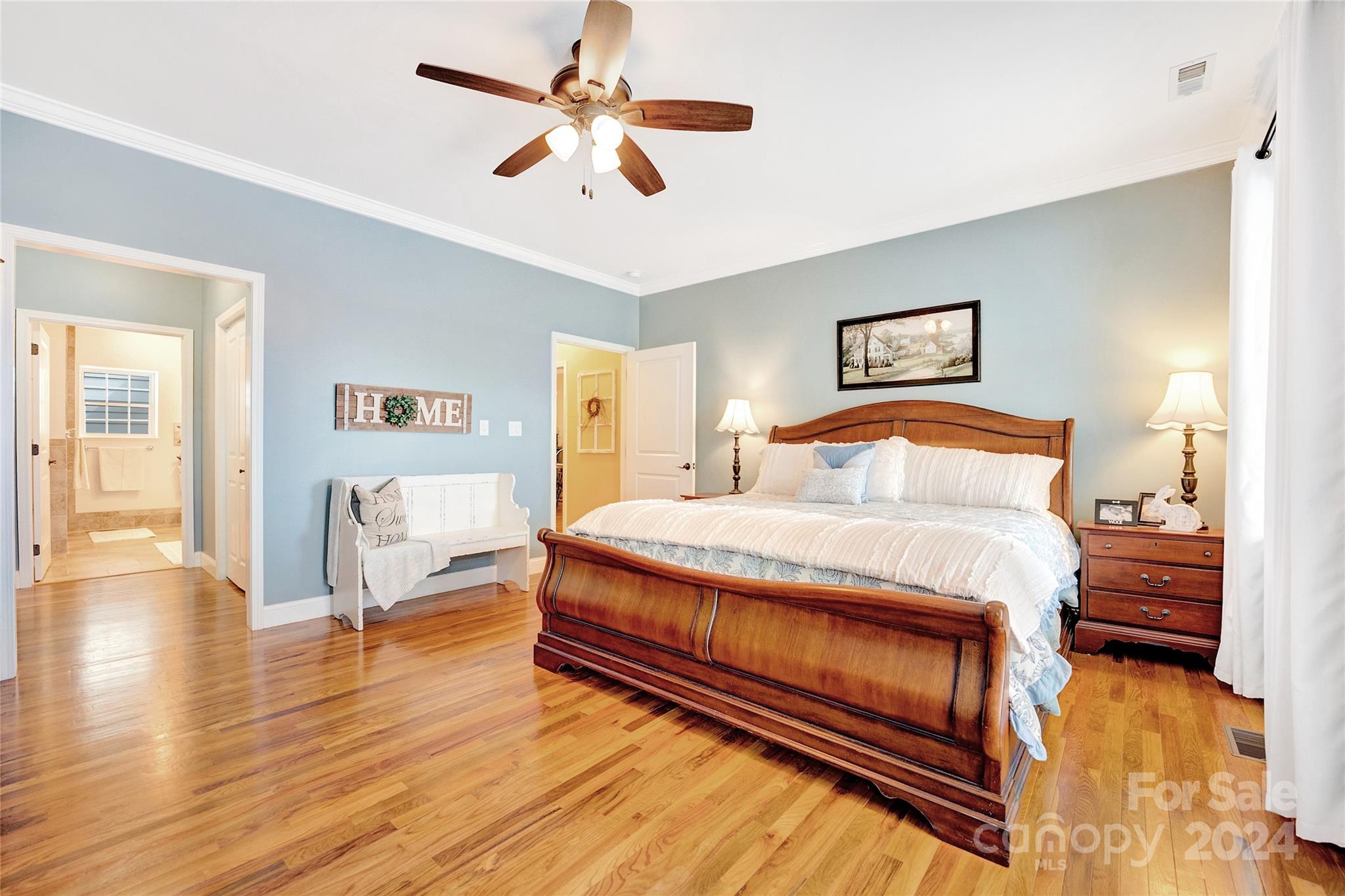 29 Willow Bend Candler, NC 28715 - Photo 23 of 45 a bedroom with a bed and wooden floor